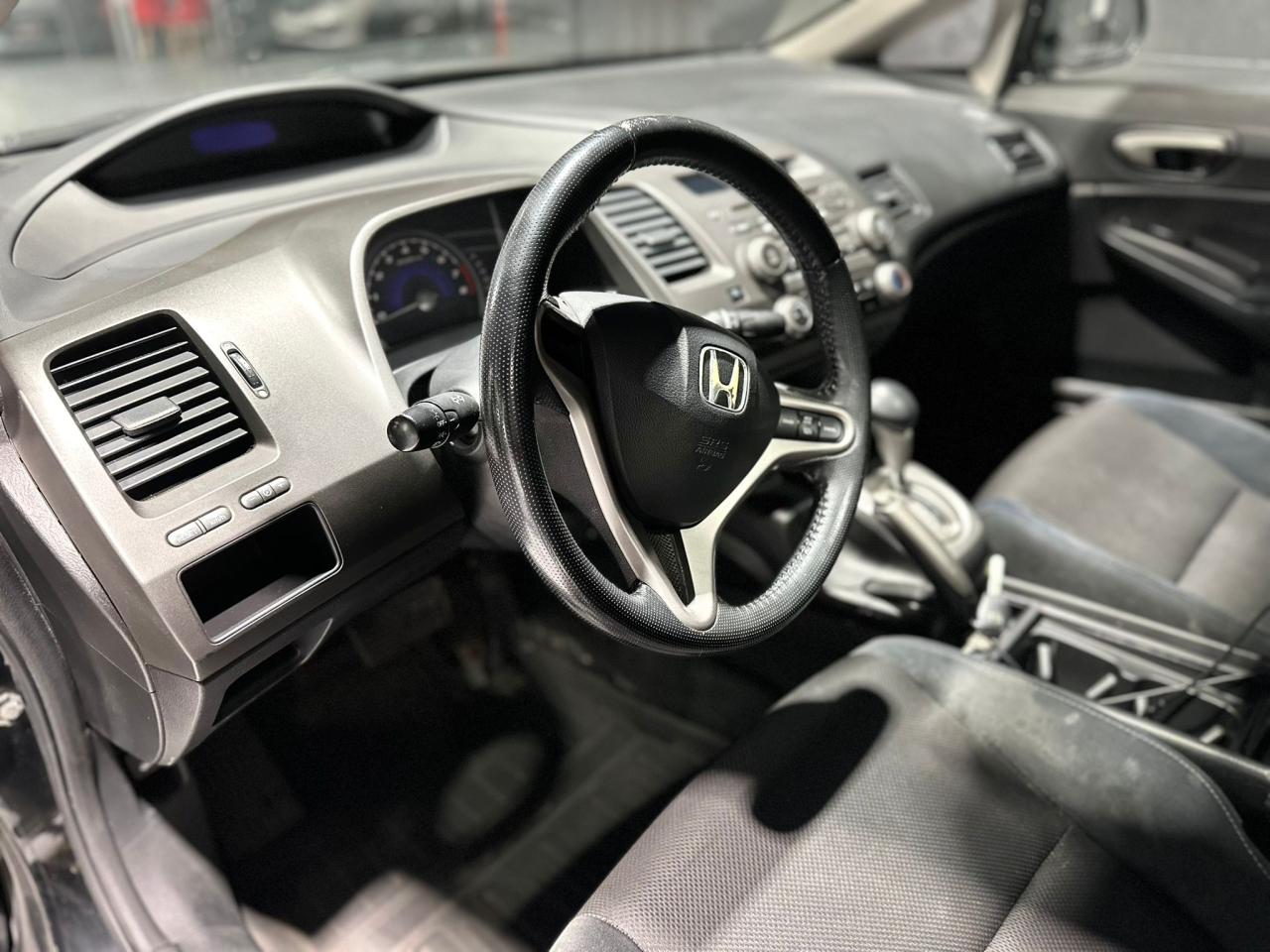 2010 Honda Civic 4dr Auto Sport Photo