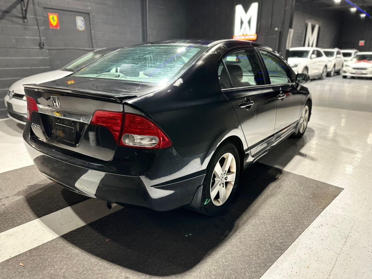 2010 Honda Civic 4dr Auto Sport Photo