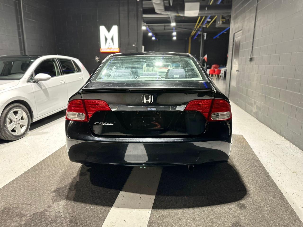 2010 Honda Civic 4dr Auto Sport Photo