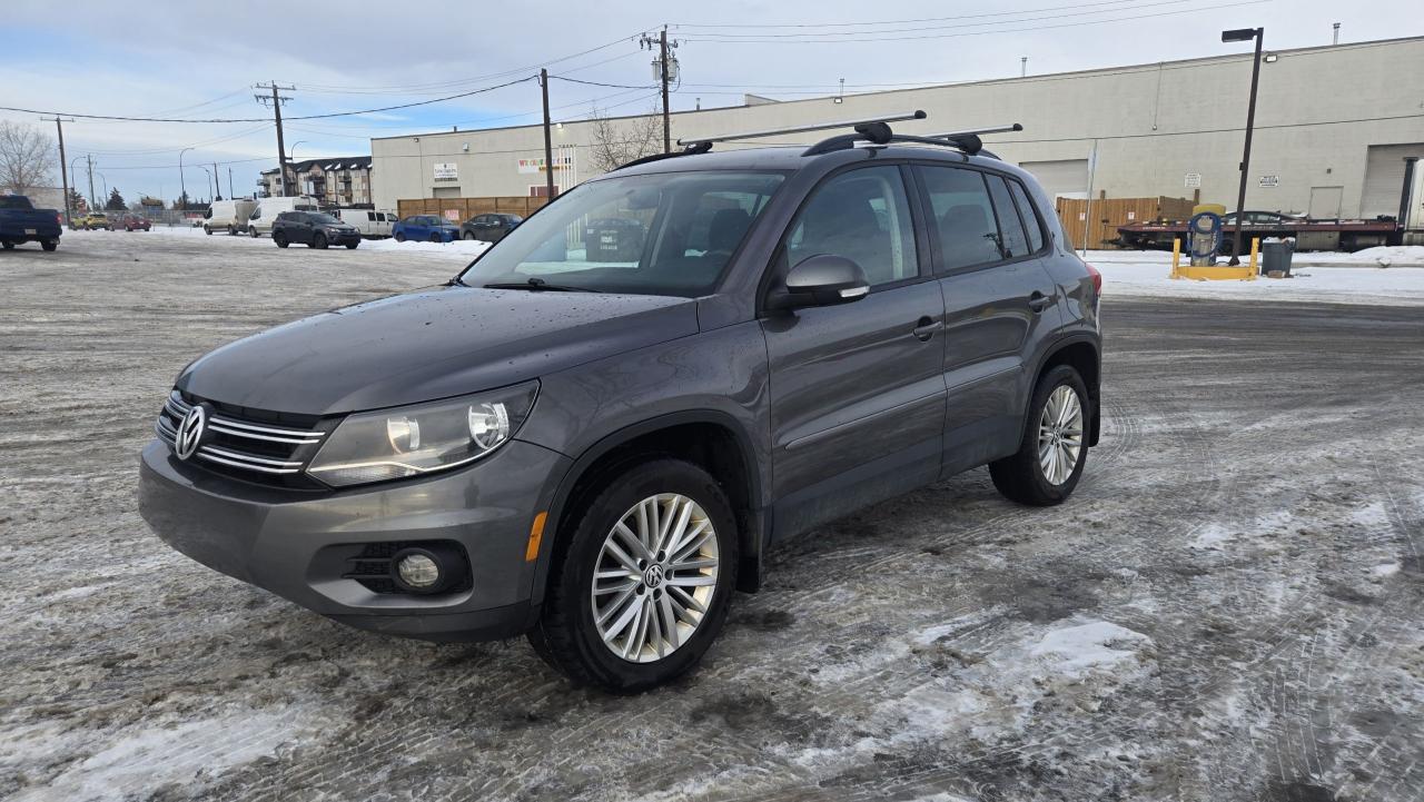 <p data-start=0 data-end=115>💥 <strong data-start=3 data-end=60>2015 Volkswagen Tiguan S &ndash; 2.0L 4CYL AWD Turbocharged</strong> 💥<br data-start=63 data-end=66 />🚙 <strong data-start=69 data-end=115>Sporty &bull; Safe &bull; All-Wheel Drive Confidence</strong></p><p data-start=117 data-end=200>📏 <strong data-start=120 data-end=132>Mileage:</strong> 115,686 KM<br data-start=143 data-end=146 />💰 <strong data-start=149 data-end=159>Price:</strong> $9,000.00 + GST<br data-start=175 data-end=178 />🆔 <strong data-start=181 data-end=193>Stock #:</strong> 0605</p><p data-start=202 data-end=429>🔥 <strong data-start=205 data-end=231>Features & Highlights:</strong><br data-start=231 data-end=234 />✅ 2.0L Turbocharged 4-Cylinder Engine<br data-start=271 data-end=274 />✅ AWD &ndash; Excellent Year-Round Traction<br data-start=311 data-end=314 />✅ Smooth Automatic Transmission<br data-start=345 data-end=348 />✅ Fuel Efficient & Fun to Drive<br data-start=379 data-end=382 />✅ Spacious Interior with Fold-Down Rear Seats</p><p data-start=431 data-end=559>🛞 <strong data-start=434 data-end=444>Tires:</strong><br data-start=444 data-end=447 />&bull; <strong data-start=449 data-end=459>Front:</strong> Continental ExtremeContact All-Season &ndash; 6/32<br data-start=504 data-end=507 />&bull; <strong data-start=509 data-end=518>Rear:</strong> Pirelli Cinturato P7 All-Season &ndash; 6/32</p><p data-start=561 data-end=661>📄 <strong data-start=564 data-end=577>Includes:</strong><br data-start=577 data-end=580 />✔ Mechanical Fitness Assessment<br data-start=611 data-end=614 />✔ Insurance Inspection<br data-start=636 data-end=639 />✔ FREE Carfax Report</p><p data-start=663 data-end=764>📞 <strong data-start=666 data-end=694>JJ Auto Sales & Services</strong><br data-start=694 data-end=697 />📱 <strong data-start=700 data-end=714>Text Only:</strong> (403) 971-9713<br data-start=729 data-end=732 />☎ <strong data-start=734 data-end=747>Mainline:</strong> (403) 248-4881</p><p>&nbsp;</p><p data-start=766 data-end=842 data-is-last-node= data-is-only-node=>👉 Clean, well-maintained AWD SUV&mdash;perfect for Calgary roads and all seasons!</p>