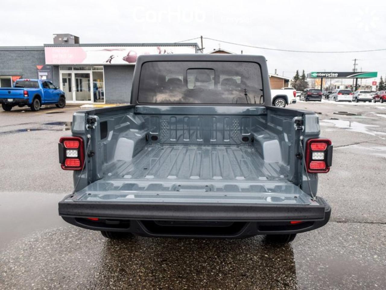 2026 Jeep Gladiator Sport S 4x4 Freedom Top Safety Group 12.3"Display Remote Start Photo