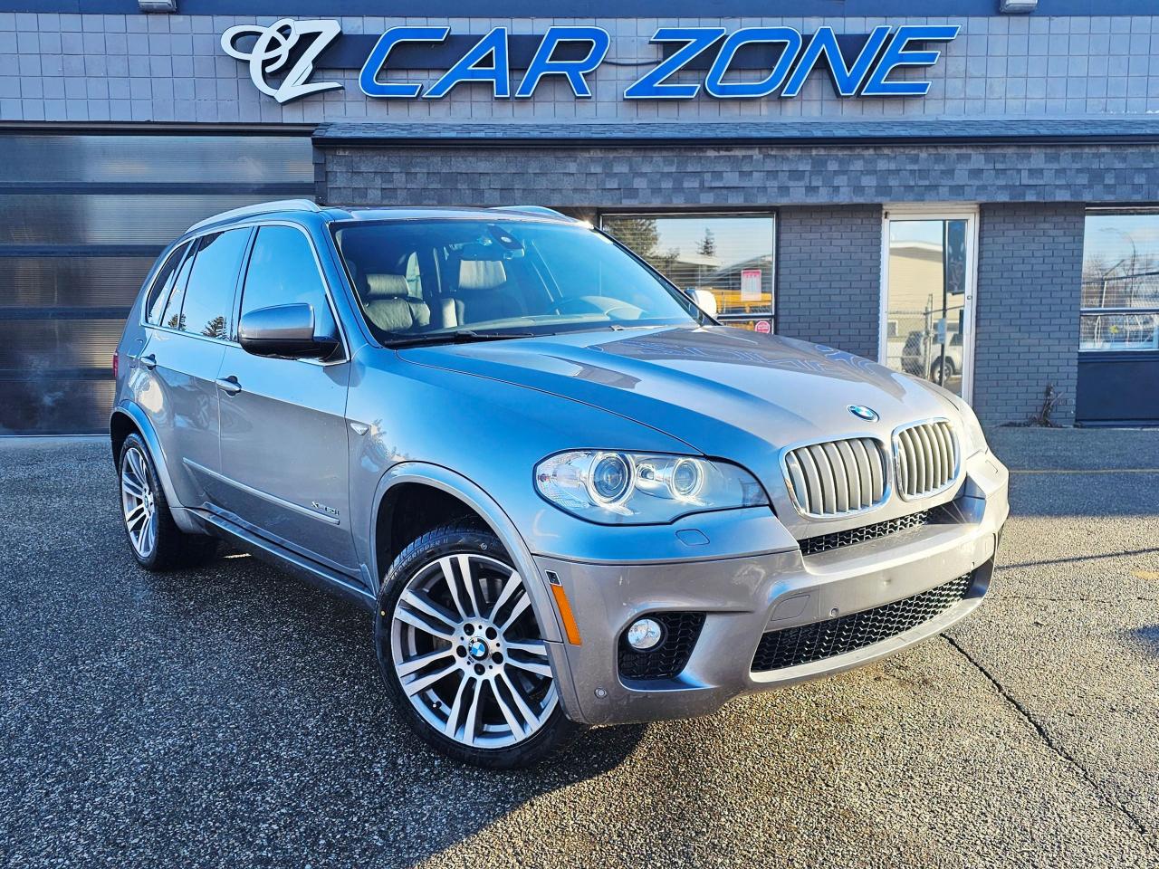 <p>Looking for a luxurious and powerful SUV that can handle any Canadian adventure? Look no further than this stunning 2013 BMW X5 50i, now available at Car Zone! This all-wheel-drive powerhouse is ready to elevate your driving experience with its sleek grey exterior and sophisticated black interior. With a robust 4.4L V8 Turbo engine under the hood, this X5 delivers exhilarating performance while providing the comfort and space you need for daily commutes or weekend getaways. This SUV has been meticulously maintained and is ready to impress.</p><p>This 2013 BMW X5 is packed with features designed for both performance and convenience. Imagine yourself commanding the road with the confidence of all-wheel drive, especially when the weather turns unpredictable. The automatic transmission ensures smooth gear changes, making every drive effortless. The spacious interior offers ample room for passengers and cargo, perfect for families or those who enjoy an active lifestyle. This X5 combines performance, style, and practicality into one impressive package.</p><p>Here are a few reasons why this 2013 BMW X5 50i stands out:</p><ul><li><strong>Heart-Pounding Power:</strong> The 4.4L V8 Turbo engine offers exhilarating acceleration.</li><li><strong>All-Weather Confidence:</strong> The all-wheel drive system gives you superior grip in all conditions.</li><li><strong>Luxurious Comfort:</strong> The black interior creates a sophisticated and inviting cabin.</li><li><strong>Spacious Versatility:</strong> The SUV/Crossover body style provides ample room for passengers and cargo.</li><li><strong>Smooth Shifting:</strong> The automatic transmission allows for a pleasurable driving experience.</li></ul><p>&nbsp;</p><p>Looking for Your Dream Car? Call Car Zone Today!</p><p>Thanks for viewing our Car Zone inventory. All of our vehicles come fully detailed with a Carfax and a mechanical fitness assessment. Drive this home today! Easy financing options. All credit welcome.&nbsp;<strong><a href=http://www.calgary.ca/finance>APPLY NOW</a>&nbsp;</strong>We even take trades. Same day approvals at&nbsp;<a href=http://www.carzonecalgary.ca/><strong>CARZONECALGARY</strong></a> or visit us in person at 2036 36 Street SE Calgary for a hassle free test drive. Let our friendly team of experts book an appointment with you and show you the Car Zone difference! AMVIC licensed dealer.&nbsp;</p>