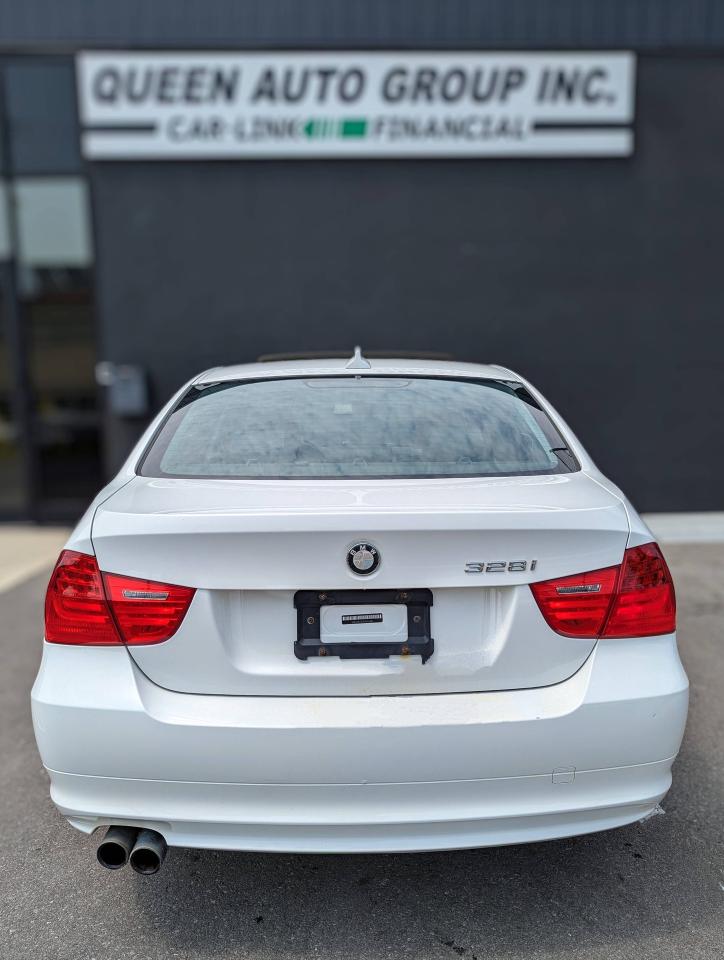 2009 BMW 3 Series 4dr Sdn 328i xDrive AWD Photo