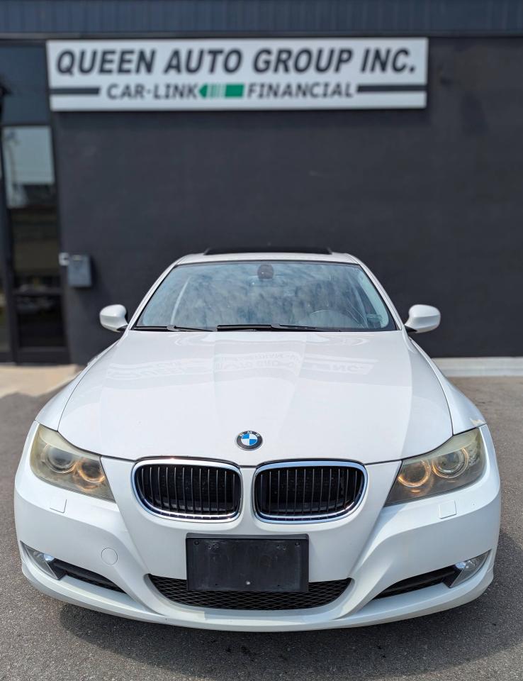 2009 BMW 3 Series 4dr Sdn 328i xDrive AWD Photo