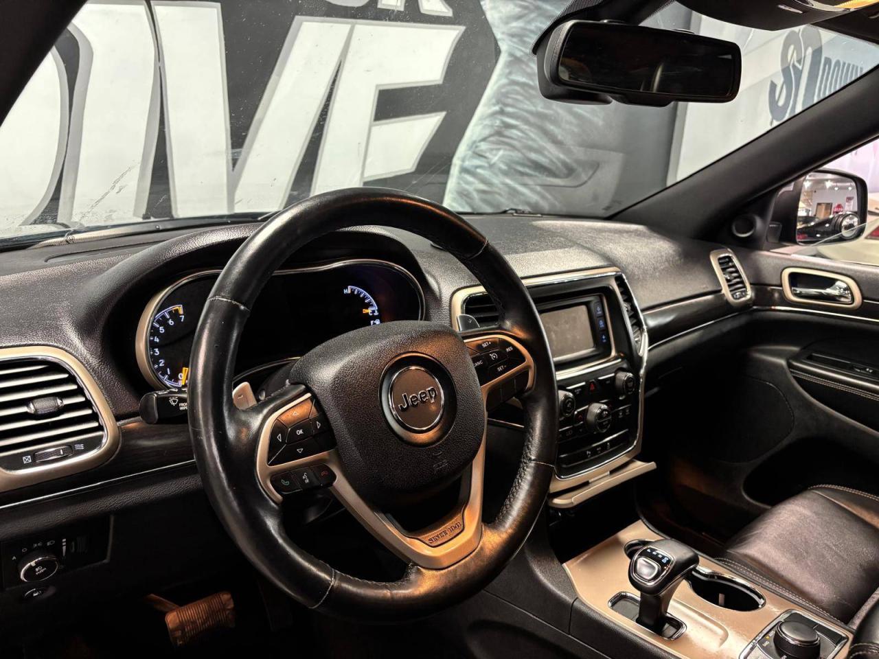 2014 Jeep Grand Cherokee 4WD 4dr Limited 33 SERVICE RECORDS $0 % DOWN FINANCE OAC Photo