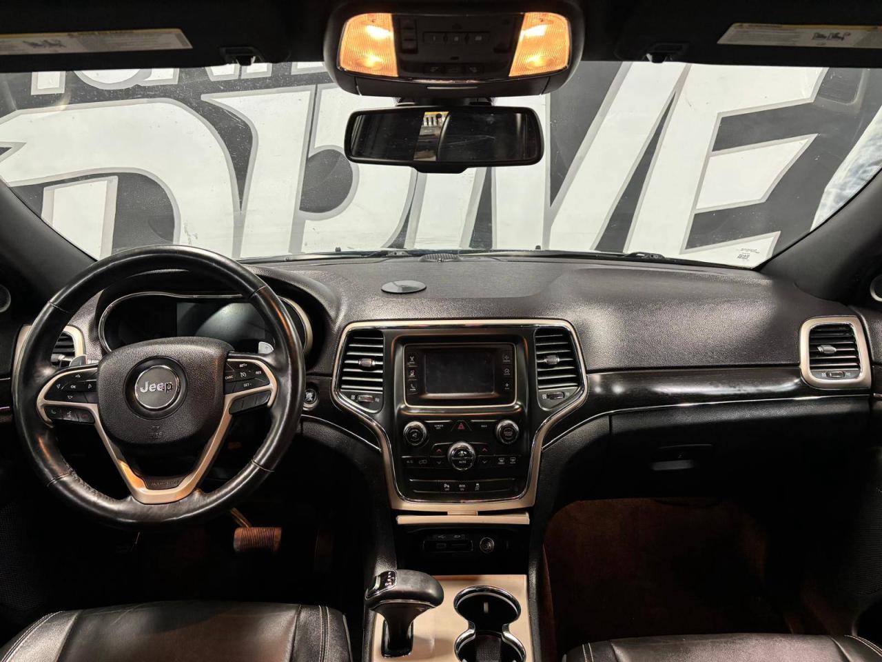 2014 Jeep Grand Cherokee 4WD 4dr Limited 33 SERVICE RECORDS $0 % DOWN FINANCE OAC Photo