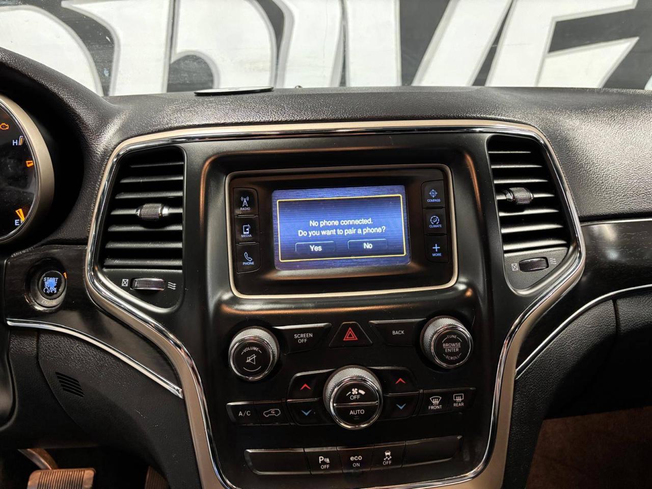 2014 Jeep Grand Cherokee 4WD 4dr Limited 33 SERVICE RECORDS $0 % DOWN FINANCE OAC Photo