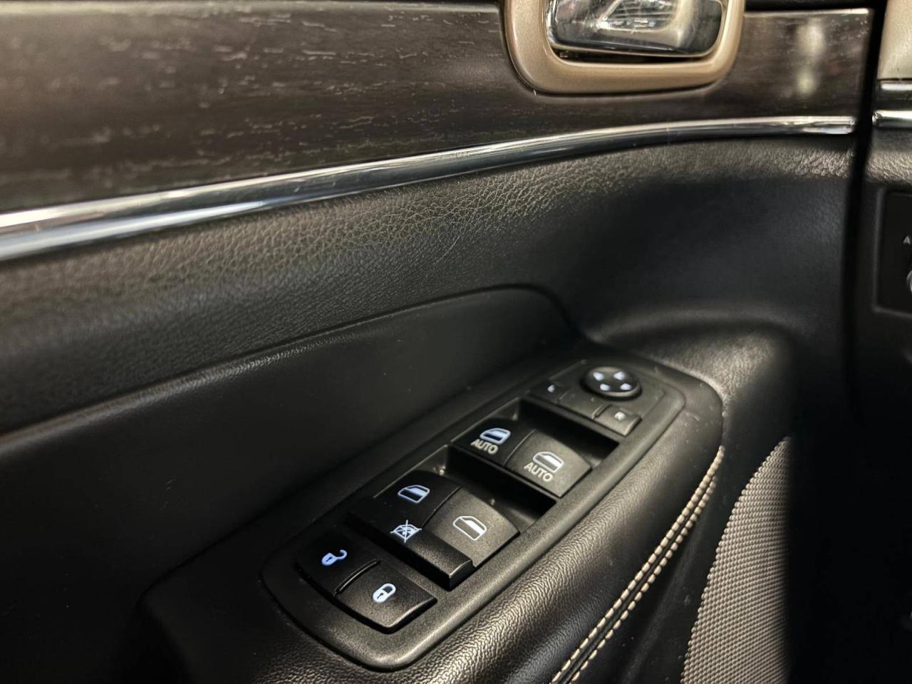 2014 Jeep Grand Cherokee 4WD 4dr Limited 33 SERVICE RECORDS $0 % DOWN FINANCE OAC Photo