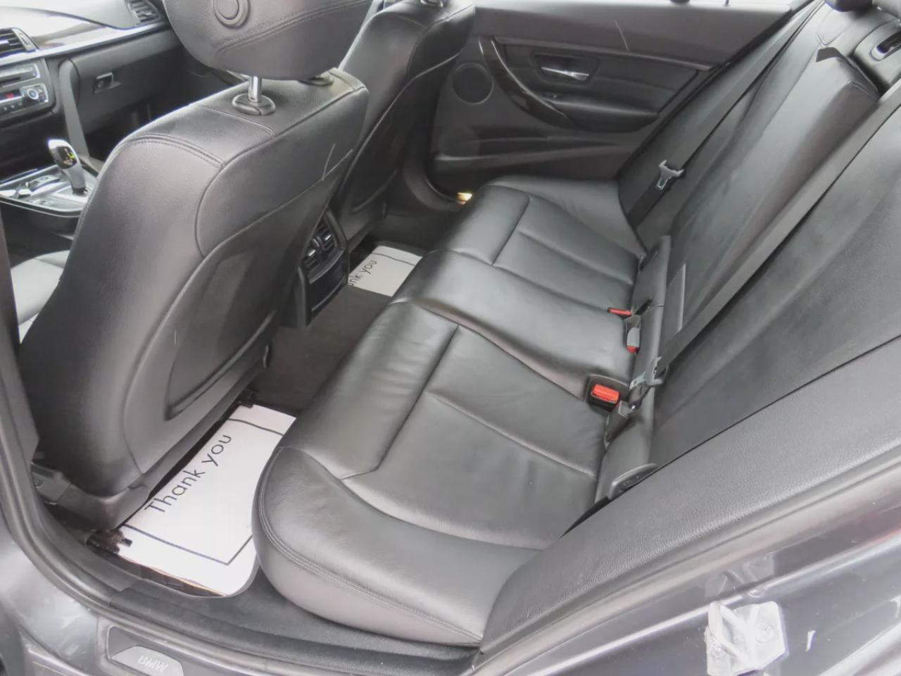 2014 BMW 3 Series 320i xDrive (**SAFETY/CERTIFIED!!**CLEAN TITLE/NO ACCIDENTS!!**VERY LOW KM!!**AWD**ALLOY RIMS**LEATHER**SUNROOF**FOG LIGHTS**HEATED SEATS**CD PLAYER**RUBBER MATS**DUAL CLIMATE CONTROL**DRIVE MODES**PUSH BUTTON START**CRUISE CONTROL**BLUETOOTH**) Photo