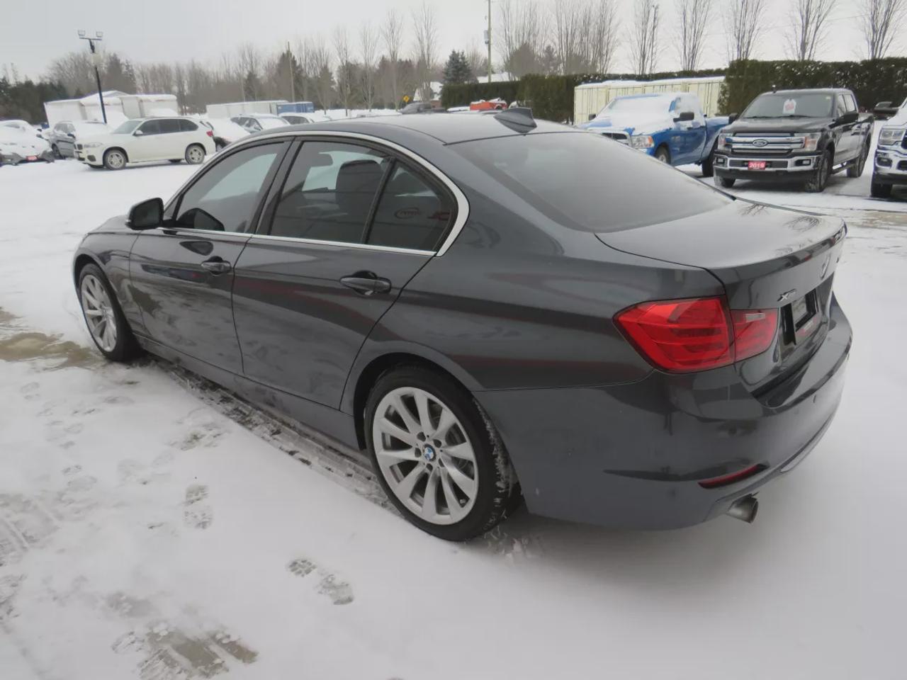 2014 BMW 3 Series 320I Xdrive  | Safety Certified | Clean Title | No Accidents | Very Low Km | AWD | Alloy Rims | Leather | Sunroof | Fog Lights | Heated Seats | CD Player | Rubber Mats | Dual Climate Control | Drive Modes | Push Button Start | Cruise Control | Bluetooth Photo