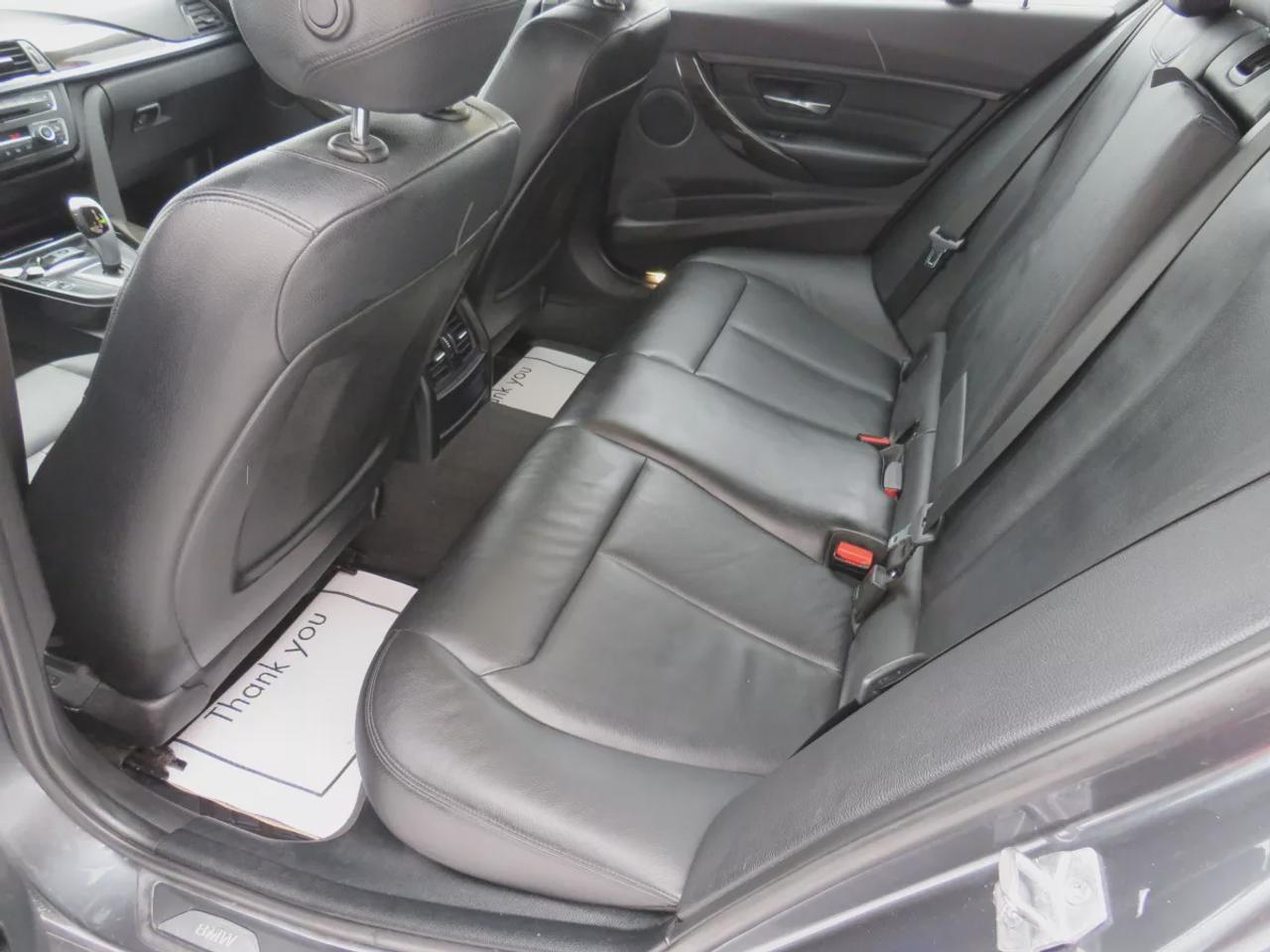 2014 BMW 3 Series 320I Xdrive  | Safety Certified | Clean Title | No Accidents | Very Low Km | AWD | Alloy Rims | Leather | Sunroof | Fog Lights | Heated Seats | CD Player | Rubber Mats | Dual Climate Control | Drive Modes | Push Button Start | Cruise Control | Bluetooth Photo