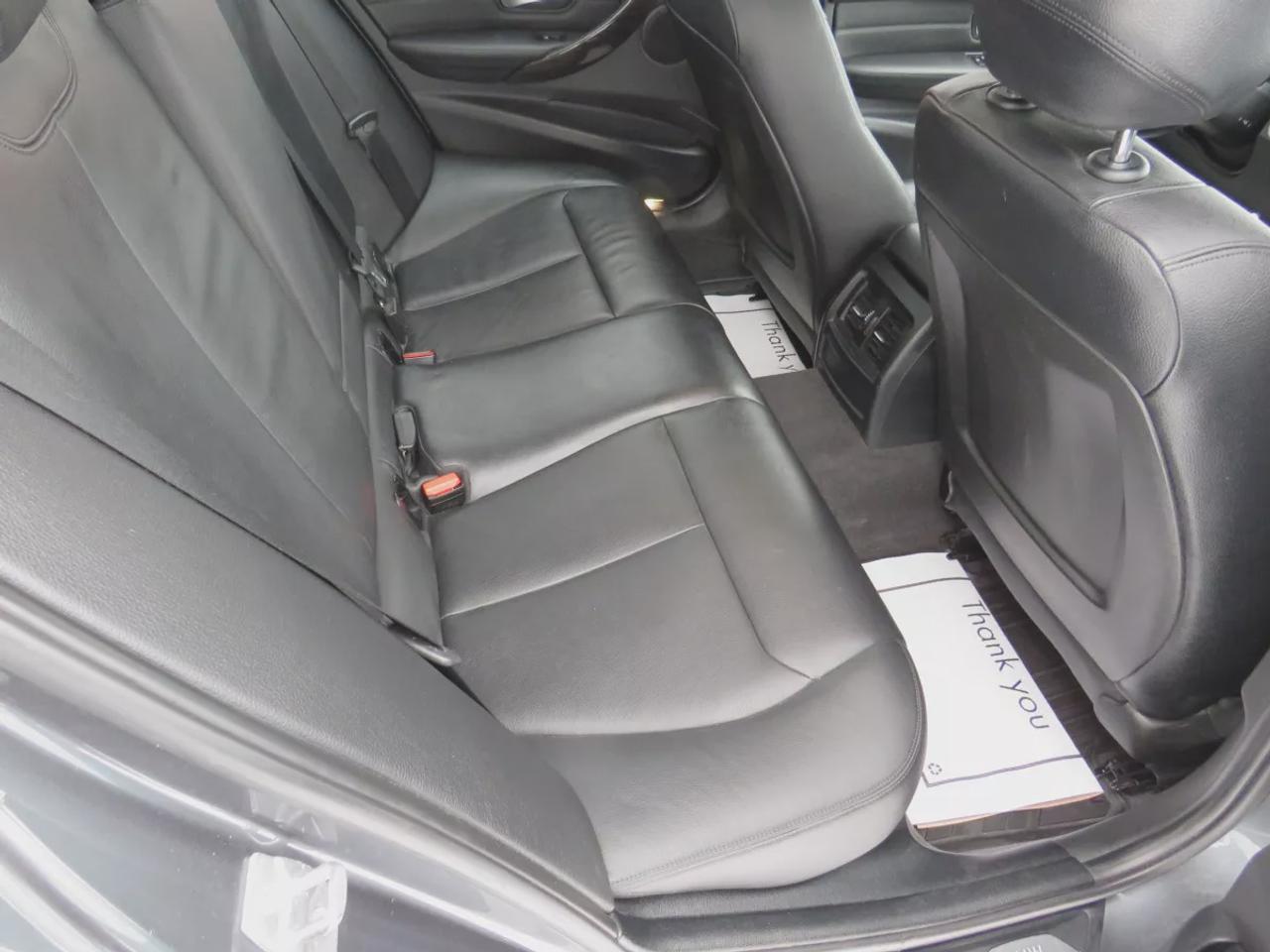 2014 BMW 3 Series 320I Xdrive  | Safety Certified | Clean Title | No Accidents | Very Low Km | AWD | Alloy Rims | Leather | Sunroof | Fog Lights | Heated Seats | CD Player | Rubber Mats | Dual Climate Control | Drive Modes | Push Button Start | Cruise Control | Bluetooth Photo