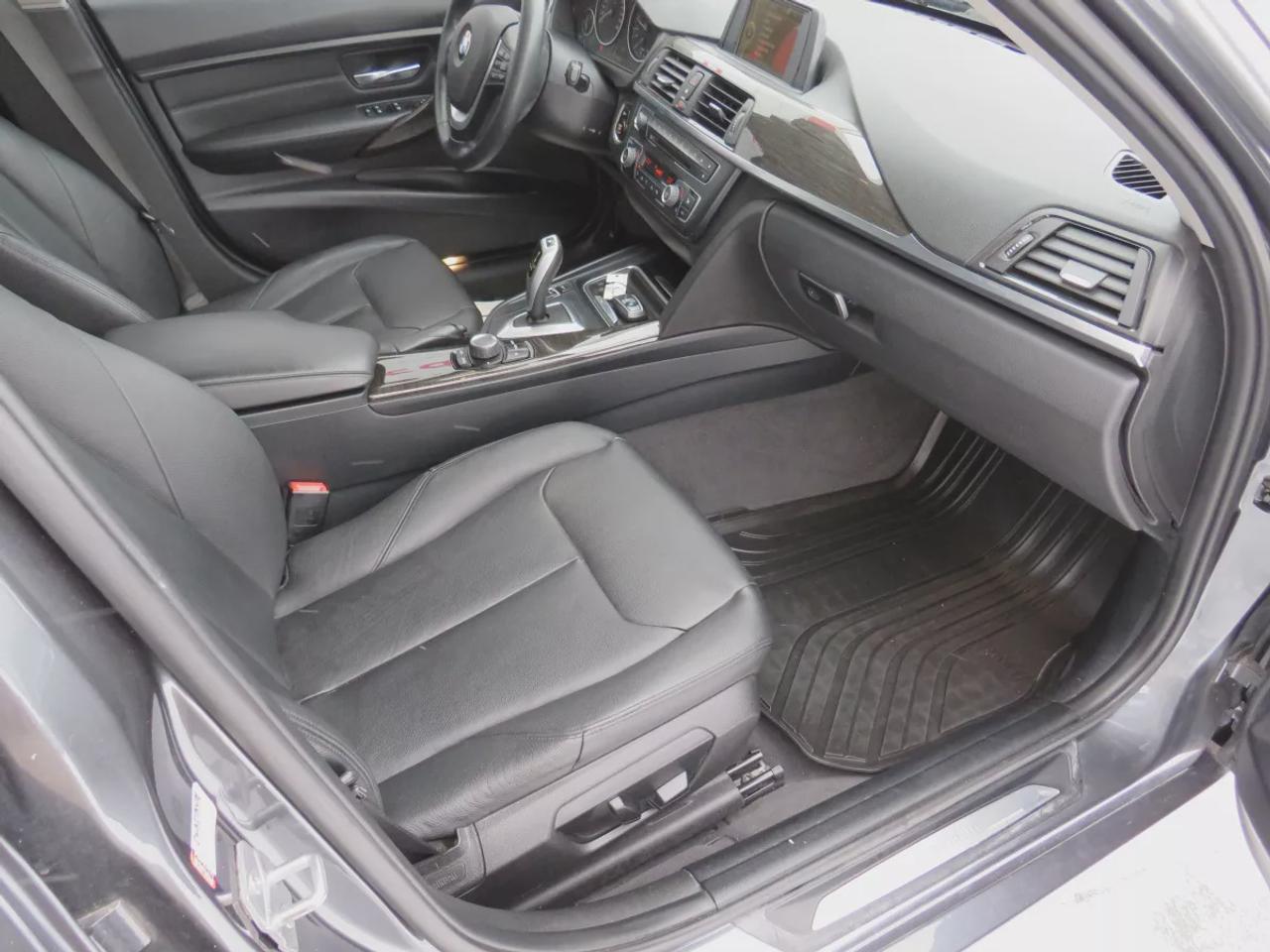 2014 BMW 3 Series 320I Xdrive  | Safety Certified | Clean Title | No Accidents | Very Low Km | AWD | Alloy Rims | Leather | Sunroof | Fog Lights | Heated Seats | CD Player | Rubber Mats | Dual Climate Control | Drive Modes | Push Button Start | Cruise Control | Bluetooth Photo