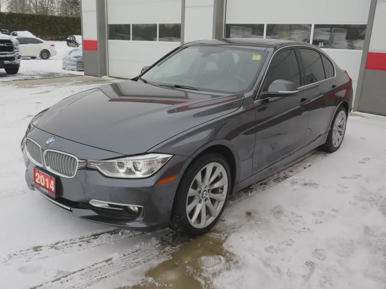 2014 BMW 3 Series 320I Xdrive  | Safety Certified | Clean Title | No Accidents | Very Low Km | AWD | Alloy Rims | Leather | Sunroof | Fog Lights | Heated Seats | CD Player | Rubber Mats | Dual Climate Control | Drive Modes | Push Button Start | Cruise Control | Bluetooth Photo