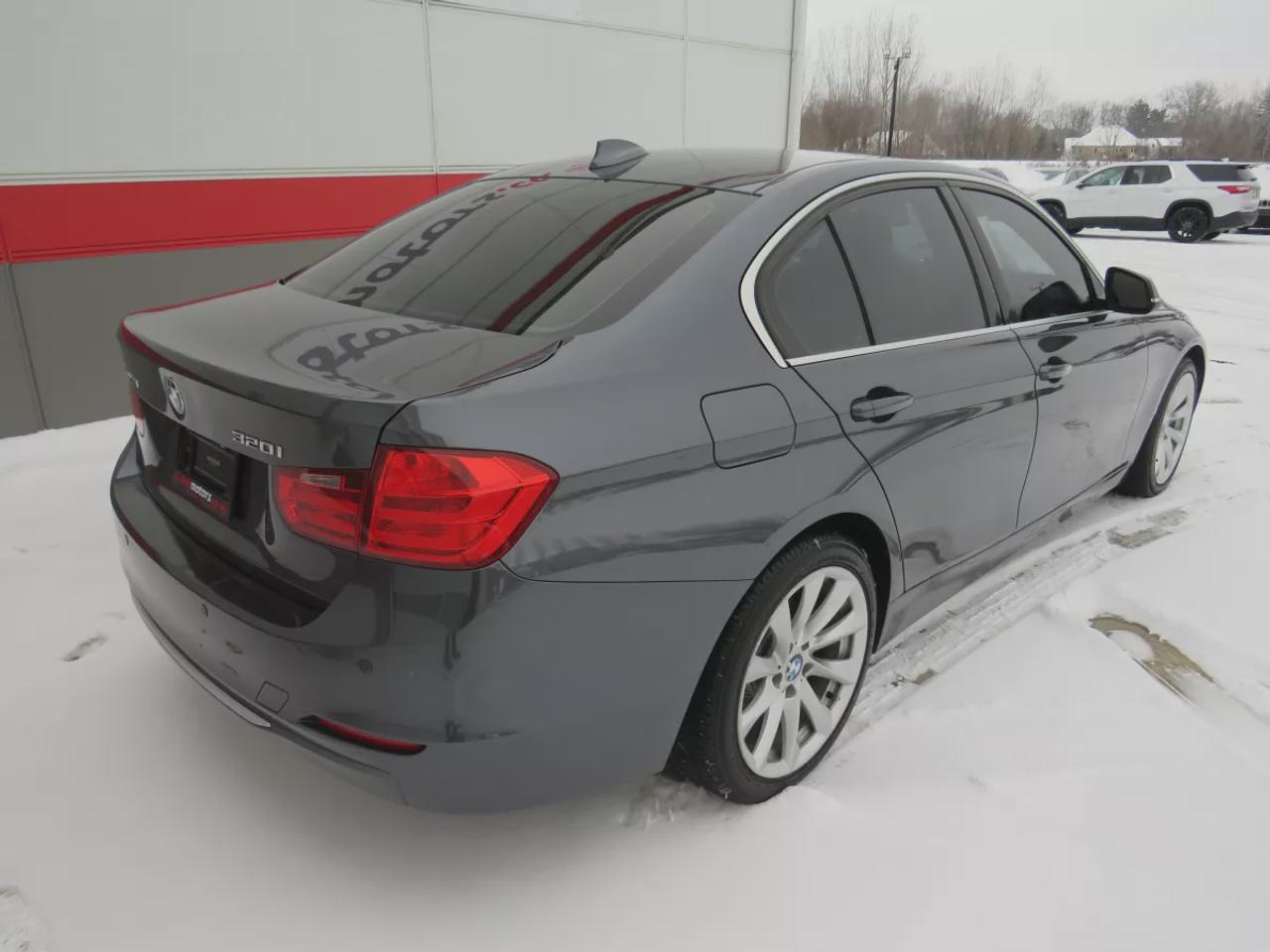 2014 BMW 3 Series 320I Xdrive  | Safety Certified | Clean Title | No Accidents | Very Low Km | AWD | Alloy Rims | Leather | Sunroof | Fog Lights | Heated Seats | CD Player | Rubber Mats | Dual Climate Control | Drive Modes | Push Button Start | Cruise Control | Bluetooth Photo
