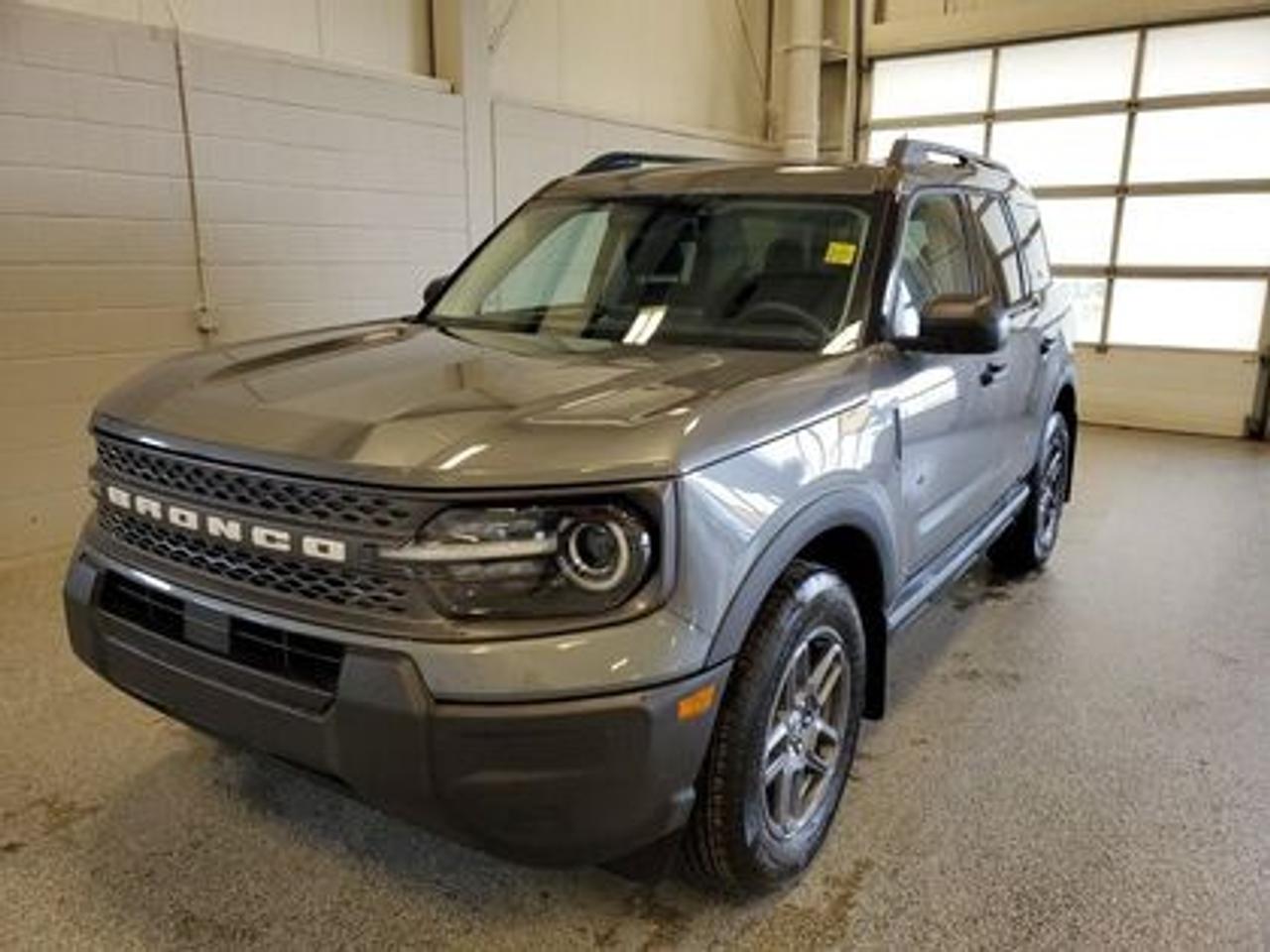 This rugged and refined 2025 Ford Bronco Sport Big Bend 200A stands out in Carbonized Grey. Built to tackle adventure and city streets alike, this 5-passenger SUV is powered by a 1.5L EcoBoost® engine, delivering 181 horsepower and 190 lb-ft of torque. Coupled with an 8-speed automatic transmission, the Bronco Sport offers impressive fuel efficiency and performance to match your lifestyle.

Key Features Include:
Heated Front Seats
8-Way Power Drivers Seat
SYNC® 4 with a 13.2 Color Touchscreen
Ford Co-Pilot360 Assist+ featuring Adaptive Cruise Control with Stop & Go
Terrain Management System with 5 G.O.A.T. Modes
LED Headlamps, Fog Lamps, and Signature Lighting
17 Carbonized Grey-Painted High Gloss Aluminum Wheels
Wireless Apple CarPlay® and Android Auto Compatibility
Rain-Sensing Windshield Wipers and Privacy Glass
Intelligent Access with Push-Button Start

Moose Jaw Ford, conveniently located at 1010 North Service Road in Moose Jaw, is your trusted destination for all your automotive needs. With an impressive 4.8-star Google rating from nearly 1,500 reviews, we are proud to deliver an exceptional vehicle-buying experience tailored just for you. Our Moose Jaw Motives set us apart, offering unbeatable value like half-priced oil changes for life on pre-owned vehicles, one year of key and remote protection, and one year of tire and rim protection. Enjoy peace of mind with every purchase. At Moose Jaw Ford, were committed to driving positive change in our community by combining exceptional service, high-quality vehicles, and a guest-first approach. Visit us today!