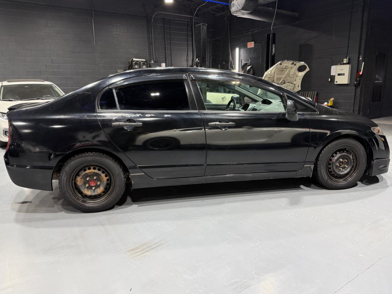 2010 Honda Civic 4dr Man DX-G Photo3