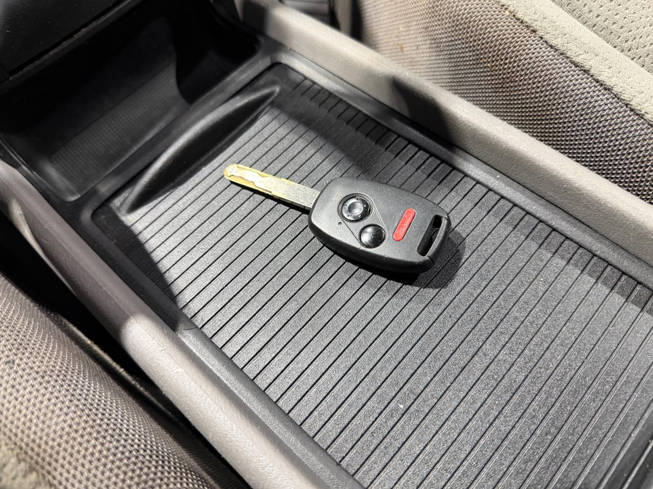 2010 Honda Civic 4dr Man DX-G Photo