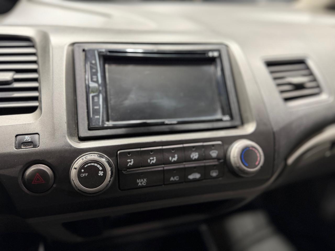 2010 Honda Civic 4dr Man DX-G Photo