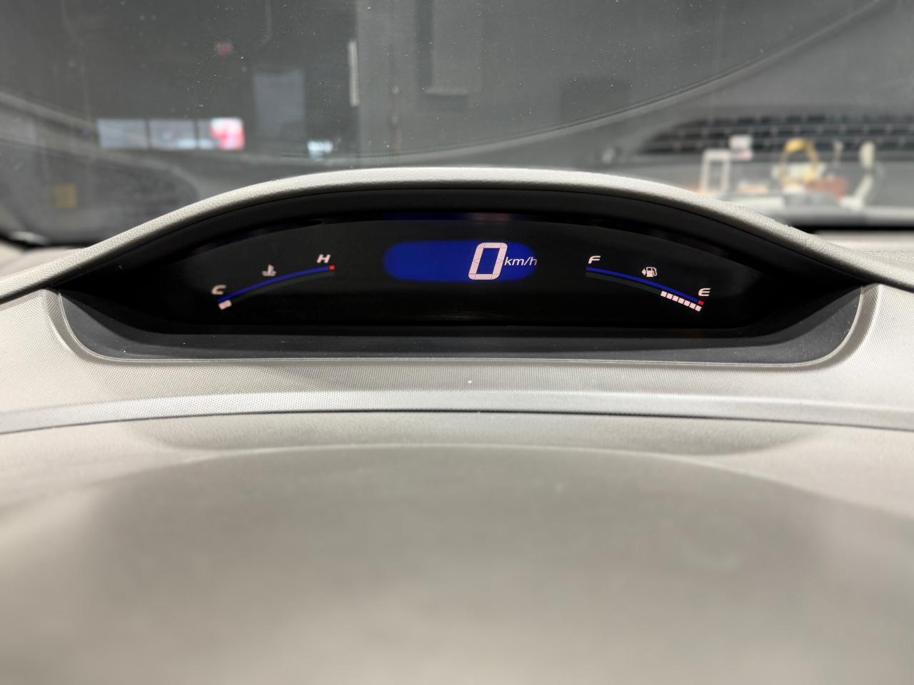 2010 Honda Civic 4dr Man DX-G Photo