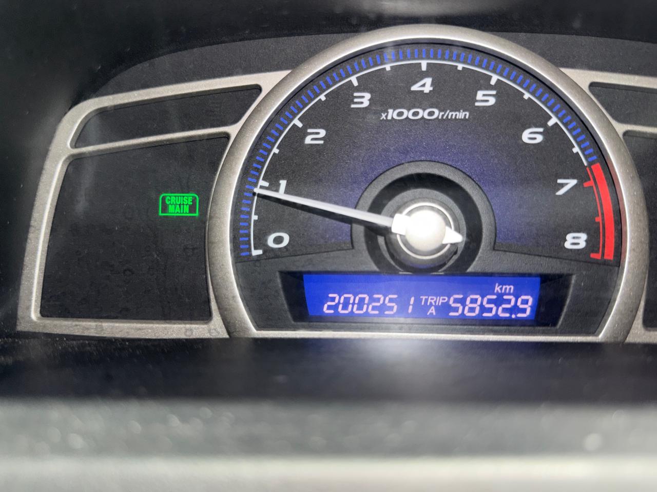 2010 Honda Civic 4dr Man DX-G Photo