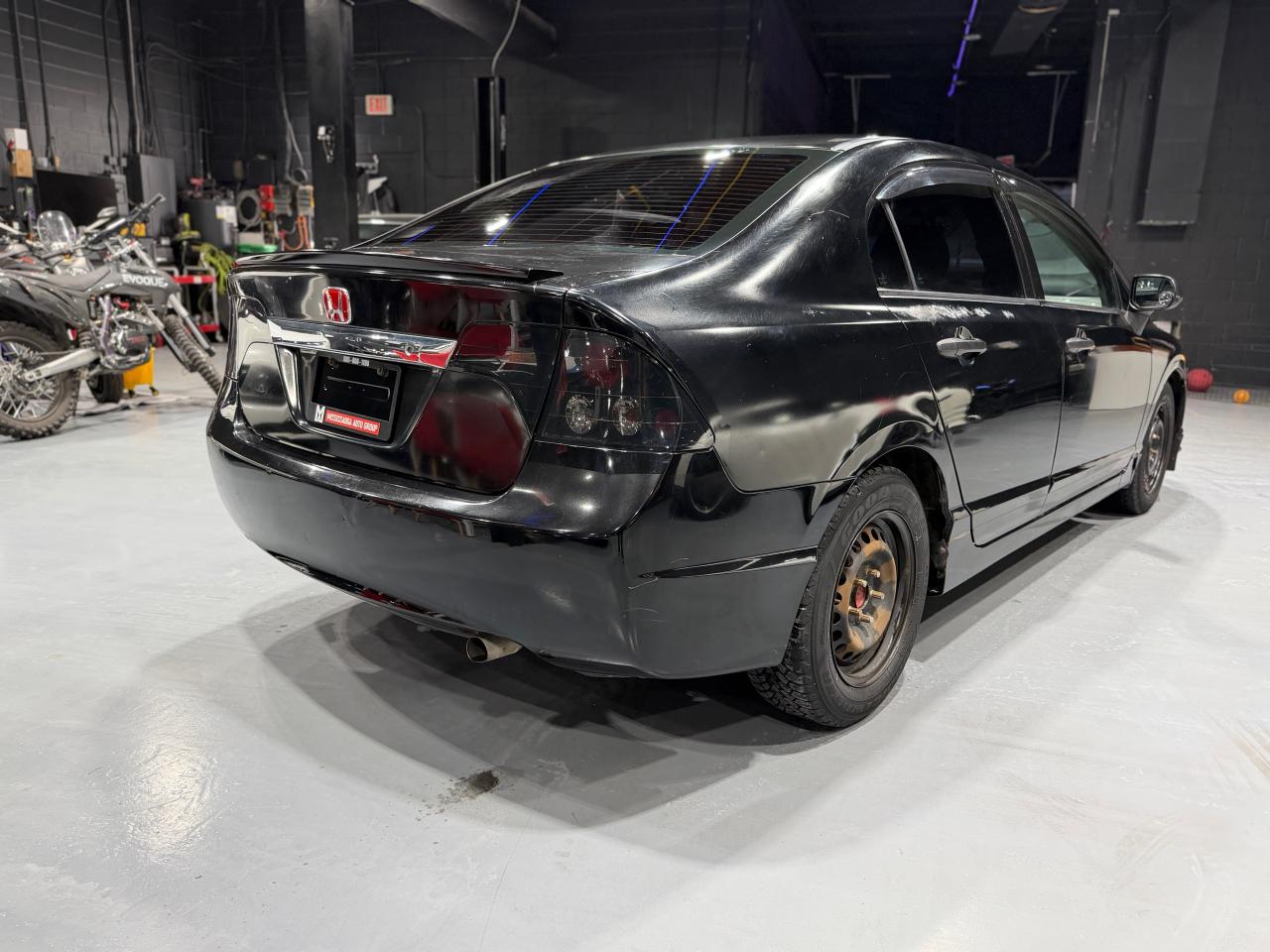 2010 Honda Civic 4dr Man DX-G Photo