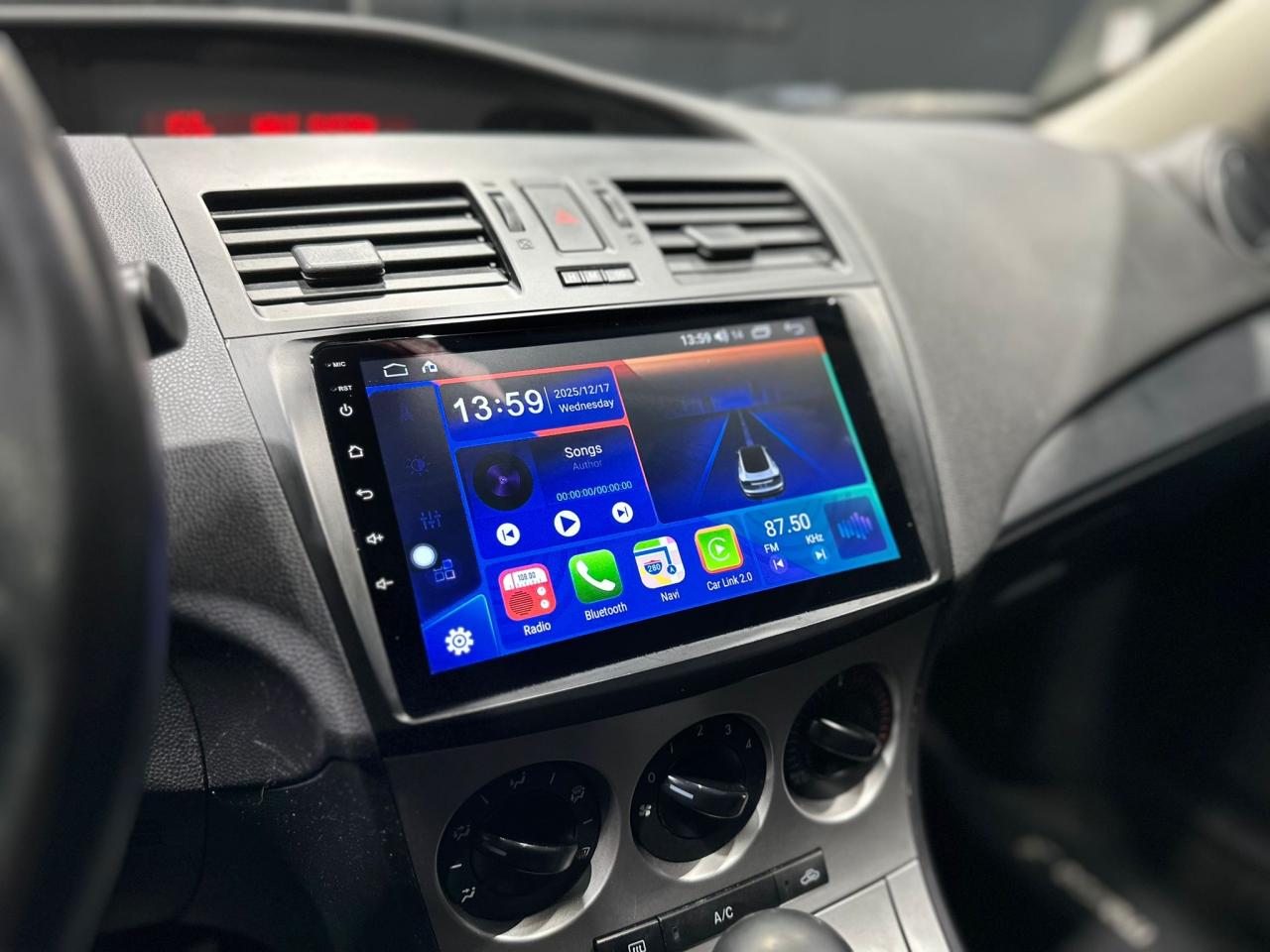 2011 Mazda MAZDA3 4dr Sdn Auto GX Photo