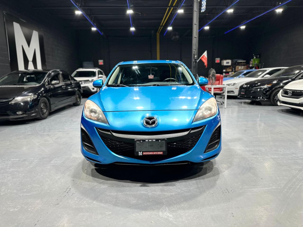 2011 Mazda MAZDA3 4dr Sdn Auto GX Photo