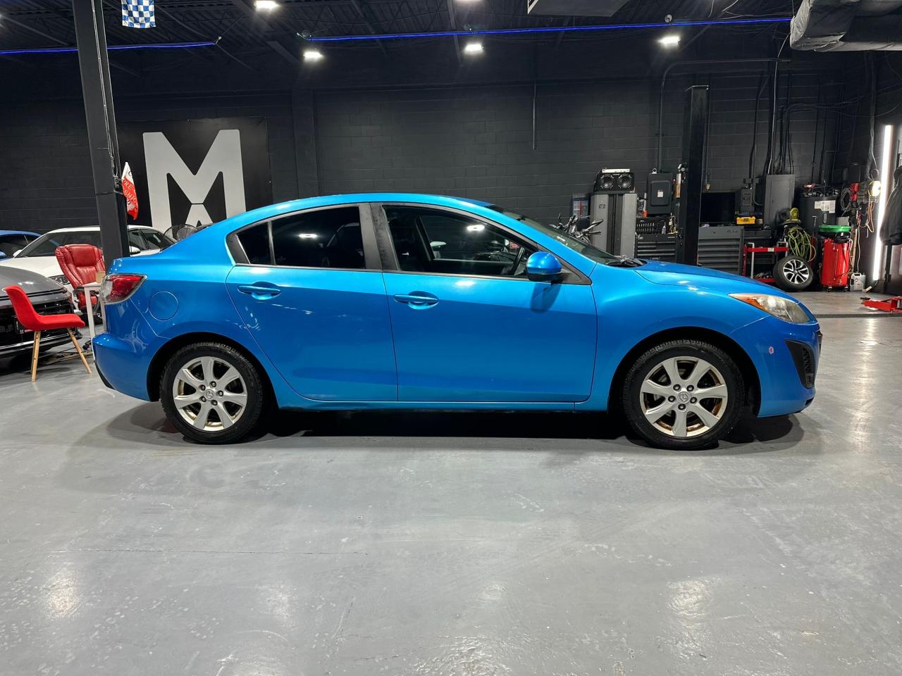 2011 Mazda MAZDA3 4dr Sdn Auto GX Photo3