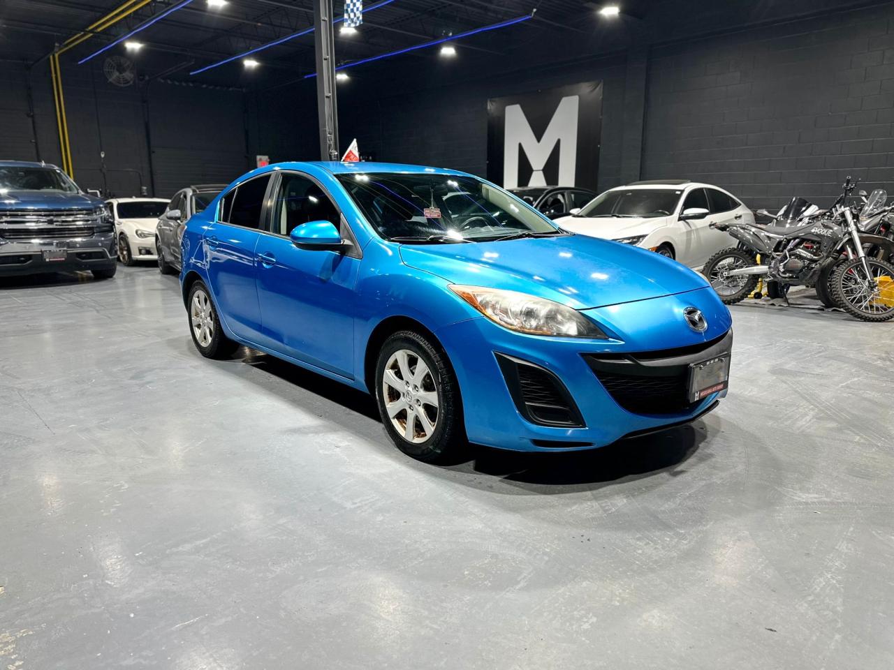 2011 Mazda MAZDA3 4dr Sdn Auto GX Photo2