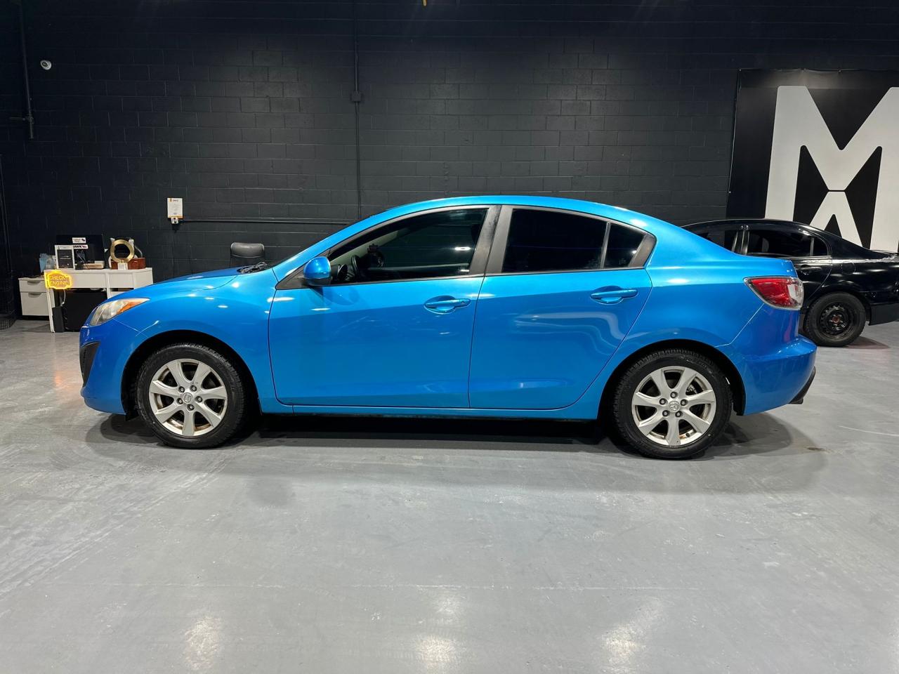 2011 Mazda MAZDA3 4dr Sdn Auto GX Photo