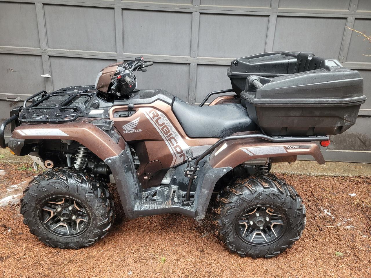 <p>The 2021 Honda FourTrax Foreman Rubicon Deluxe (TRX520FA7) is a premium utility ATV known for its durability, featuring a 518cc engine, Independent Rear Suspension (IRS) for a smoother ride, and Hondas Automatic Dual-Clutch Transmission (DCT) with electronic power steering (EPS) for effortless operation, blending manual control with automatic convenience, plus locking front differential and strong towing capacity, available in colors like Matte Molasses Brown and Phantom Camo.</p><p>Almost $4000 in Accessories Included.<br>HONDA Cup Holder $94.<br>HONDA Winch Kit $1153.<br>HONDA Windshield $410.<br>HONDA Heated Grips $320.<br>HONDA Frame Skid Plate $496.<br>KIMPEX Fender Protectors $222.<br>HONDA Rear A-Arm Guards $222.<br>HONDA Front A-Arm Guards $180.<br>HONDA Rear Frame Skid Plate $248.<br>KIMPEX Rear Seat with Heated Grips $555.</p><div class=otQkpb role=heading aria-level=3 data-animation-nesting= data-sfc-cp= data-processed=true data-sae= data-complete=true><strong class=Yjhzub data-complete=true>Key Specifications</strong><button class=rBl3me tabindex=0 data-amic=true data-icl-uuid=ded54b15-d49c-40f1-8d5e-9bc038f794b6 aria-label=View related links data-wiz-attrbind=disabled=PaRLjb_k/C5gNJc;class=PaRLjb_k/UpSNec; data-ved=2ahUKEwiVipqB1MWRAxWzrYkEHZvhOFsQye0OegQIAxAA></button></div><ul class=KsbFXc U6u95 data-complete=true data-processed=true><li data-hveid=CAQQAA data-complete=true data-sae=><span class=T286Pc data-sfc-cp= data-complete=true><strong class=Yjhzub data-complete=true>Engine:</strong>&nbsp;518cc liquid-cooled longitudinally mounted single-cylinder four-stroke.</span></li><li data-hveid=CAQQAQ data-complete=true data-sae=><span class=T286Pc data-sfc-cp= data-complete=true><strong class=Yjhzub data-complete=true>Transmission:</strong>&nbsp;Five-speed Automatic Dual-Clutch Transmission (DCT) with reverse and a high/low range sub-transmission.</span></li><li data-hveid=CAQQAg data-complete=true data-sae=><span class=T286Pc data-sfc-cp= data-complete=true><strong class=Yjhzub data-complete=true>Driveline:</strong>&nbsp;Direct front and rear driveshafts with TraxLok&reg; and a locking front differential.</span></li><li data-hveid=CAQQAw data-complete=true data-sae=><span class=T286Pc data-sfc-cp= data-complete=true><strong class=Yjhzub data-complete=true>Chassis & Suspension:</strong>&nbsp;Independent Double Wishbone front suspension (7.3 in travel) and Independent Dual-Arm rear suspension (8.5 in travel).</span></li><li data-hveid=CAQQBA data-complete=true data-sae=><span class=T286Pc data-sfc-cp= data-complete=true><strong class=Yjhzub data-complete=true>Towing & Hauling:</strong>&nbsp;1,322 lb towing capacity; front rack capacity of 99 lb and rear rack capacity of 187 lb.</span></li><li data-hveid=CAQQBQ data-complete=true data-sae=><span class=T286Pc data-sfc-cp= data-complete=true><strong class=Yjhzub data-complete=true>Dimensions:</strong>&nbsp;84.5 length, 47.4 width, and a seat height of 35.8.</span></li><li data-hveid=CAQQBg data-complete=true data-sae=><span class=T286Pc data-sfc-cp= data-complete=true><strong class=Yjhzub data-complete=true>Curb Weight:</strong>&nbsp;722 lbs (ready to ride with all fluids).</span><span class=uJ19be notranslate data-wiz-uids=PaRLjb_19,PaRLjb_1a,PaRLjb_1b data-complete=true><span class=vKEkVd data-animation-atomic= data-wiz-attrbind=class=PaRLjb_19/TKHnVd; data-sae=>&nbsp;<button class=rBl3me tabindex=0 data-amic=true data-icl-uuid=c0b1b55f-e9c2-4c01-b1da-212a0b45de1c aria-label=View related links data-wiz-attrbind=disabled=PaRLjb_19/C5gNJc;class=PaRLjb_19/UpSNec; data-ved=2ahUKEwiVipqB1MWRAxWzrYkEHZvhOFsQye0OegQIBBAH></button></span></span></li></ul><div class=otQkpb role=heading aria-level=3 data-animation-nesting= data-sfc-cp= data-complete=true data-processed=true data-sae=><strong class=Yjhzub data-complete=true>Deluxe Features</strong><button class=rBl3me tabindex=0 data-amic=true data-icl-uuid=8b7e607c-1711-43bb-baa1-3729da7f5a9b aria-label=View related links data-wiz-attrbind=disabled=PaRLjb_1l/C5gNJc;class=PaRLjb_1l/UpSNec; data-ved=2ahUKEwiVipqB1MWRAxWzrYkEHZvhOFsQye0OegQIBRAA></button></div><div class=Y3BBE data-sfc-cp= data-hveid=CAYQAA data-processed=true data-complete=true>The Deluxe trim adds several aesthetic and performance enhancements over the standard Rubicon models:<span class=uJ19be notranslate data-wiz-uids=PaRLjb_1p,PaRLjb_1q,PaRLjb_1r data-complete=true data-processed=true><span class=vKEkVd data-animation-atomic= data-wiz-attrbind=class=PaRLjb_1p/TKHnVd; data-sae=>&nbsp;<button class=rBl3me tabindex=0 data-amic=true data-icl-uuid=92d54668-1b2a-438c-8cbe-115094184ab7 aria-label=View related links data-wiz-attrbind=disabled=PaRLjb_1p/C5gNJc;class=PaRLjb_1p/UpSNec; data-ved=2ahUKEwiVipqB1MWRAxWzrYkEHZvhOFsQye0OegQIBhAB></button></span></span></div><ul class=KsbFXc U6u95 data-complete=true data-processed=true><li data-hveid=CAgQAA data-complete=true data-sae=><span class=T286Pc data-sfc-cp= data-complete=true><strong class=Yjhzub data-complete=true>Lightweight Aluminum Wheels:</strong>&nbsp;Features contrast-cut aluminum wheels for a premium look.</span></li><li data-hveid=CAgQAQ data-complete=true data-sae=><span class=T286Pc data-sfc-cp= data-complete=true><strong class=Yjhzub data-complete=true>Painted Bodywork:</strong>&nbsp;Available in Matte Molasses Brown, which helps deflect superficial scratches compared to standard plastic.</span></li><li data-hveid=CAgQAg data-complete=true data-sae=><span class=T286Pc data-sfc-cp= data-complete=true><strong class=Yjhzub data-complete=true>Special Accents:</strong>&nbsp;Includes silver-painted shock springs and suspension arms.</span></li><li data-hveid=CAgQAw data-complete=true data-sae=><span class=T286Pc data-sfc-cp= data-complete=true><strong class=Yjhzub data-complete=true>Electronic Power Steering (EPS):</strong>&nbsp;Standard on the Deluxe model, providing lighter steering effort and reduced kickback.</span><span class=uJ19be notranslate data-wiz-uids=PaRLjb_33,PaRLjb_34,PaRLjb_35 data-complete=true><span class=vKEkVd data-animation-atomic= data-wiz-attrbind=class=PaRLjb_33/TKHnVd; data-sae=>&nbsp;<button class=rBl3me tabindex=0 data-amic=true data-icl-uuid=b89210c5-db27-4951-bf3c-5b6a4ccd0ec6 aria-label=View related links data-wiz-attrbind=disabled=PaRLjb_33/C5gNJc;class=PaRLjb_33/UpSNec; data-ved=2ahUKEwiVipqB1MWRAxWzrYkEHZvhOFsQye0OegQICBAE></button></span></span></li></ul><div class=otQkpb role=heading aria-level=3 data-animation-nesting= data-sfc-cp= data-complete=true data-processed=true data-sae=><strong class=Yjhzub data-complete=true>Performance Highlights</strong><button class=rBl3me tabindex=0 data-amic=true data-icl-uuid=0dfaf995-9199-4a45-b666-de0de406f3bf aria-label=View related links data-wiz-attrbind=disabled=PaRLjb_3f/C5gNJc;class=PaRLjb_3f/UpSNec; data-ved=2ahUKEwiVipqB1MWRAxWzrYkEHZvhOFsQye0OegQICRAA></button></div><ul class=KsbFXc U6u95 data-complete=true data-processed=true><li data-hveid=CAoQAA data-complete=true data-sae=><span class=T286Pc data-sfc-cp= data-complete=true><strong class=Yjhzub data-complete=true>Speed:</strong>&nbsp;Capable of top speeds up to approximately 54&ndash;65 mph depending on conditions.</span></li><li data-hveid=CAoQAQ data-complete=true data-sae=><span class=T286Pc data-sfc-cp= data-complete=true><strong class=Yjhzub data-complete=true>Ride Comfort:</strong>&nbsp;The Independent Rear Suspension (IRS) ensures constant tire contact and a smoother ride over rough terrain.</span></li><li data-hveid=CAoQAg data-complete=true data-sae=><span class=T286Pc data-sfc-cp= data-complete=true><strong class=Yjhzub data-complete=true>Honda Pro-Connect&trade;:</strong>&nbsp;The racks are designed to quickly attach accessories like cargo boxes without tools.</span></li></ul>