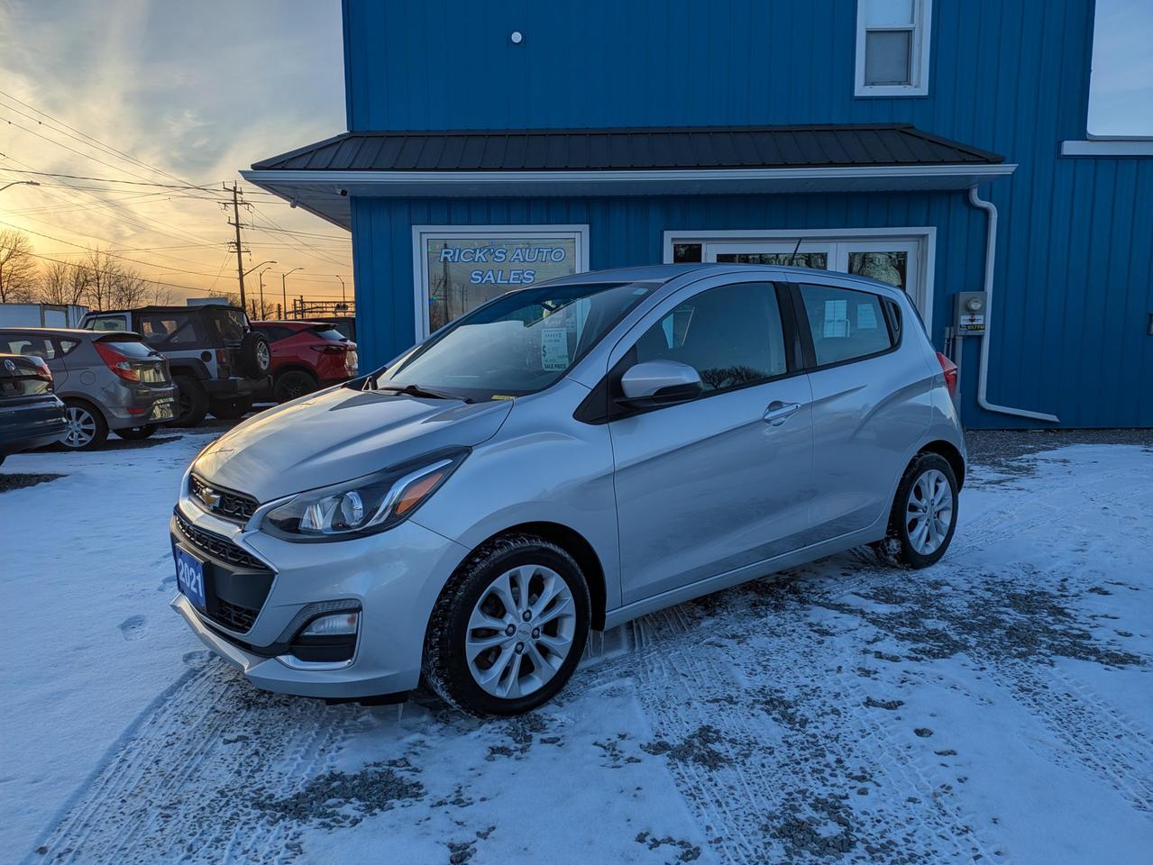 <p>Looking for a fuel-efficient and fun-to-drive vehicle thats perfect for navigating the city or cruising down the highway? Check out this stylish 2021 Chevrolet Spark 1LT, now available at Ricks Auto Sales! This sleek silver hatchback is ready to turn heads with its modern design and practical features. With a comfortable black interior and automatic transmission, youll enjoy a smooth and easy driving experience. This Spark has been well-maintained and has 159,828km on the odometer, making it a reliable choice for your daily commute or weekend adventures.</p><p>This 2021 Chevrolet Spark 1LT offers a fantastic blend of practicality and personality. Its compact size makes parking a breeze, while the four-door design provides easy access for passengers and cargo. Experience the joy of efficient driving with this gasoline-powered vehicle, perfect for saving money at the pump. This Spark is a great choice for anyone looking for a dependable and affordable vehicle.</p><p>Here are five features that make this 2021 Chevrolet Spark 1LT a standout choice:</p><ul><li><strong>Fuel Sipping Efficiency:</strong> Enjoy incredible fuel economy, saving you money on your daily commute and weekend getaways.</li><li><strong>City-Smart Design:</strong> Its compact size makes it perfect for navigating urban environments and squeezing into tight parking spots.</li><li><strong>Automatic Convenience:</strong> The automatic transmission provides a smooth and effortless driving experience.</li><li><strong>Modern and Stylish:</strong> The sleek silver exterior and comfortable black interior create a modern and inviting atmosphere.</li><li><strong>Hatchback Versatility:</strong> The hatchback design offers ample cargo space, making it easy to haul groceries, luggage, or anything else you need.</li><li style=font-weight: bold;><strong>Clean CARFAX</strong></li><li style=font-weight: bold;><strong>ONE OWNER</strong></li></ul><p><strong><em>Powered by AutoIntelligence&trade;</em></strong> Vehicle information has been generated using artificial intelligence and is provided for informational purposes only. While efforts are made to ensure accuracy, please confirm all details directly with the dealer.</p><p style=margin: 0in;><strong><span lang=EN-CA style=font-size: 14.0pt; font-family: Segoe UI Emoji,sans-serif; mso-ascii-font-family: system-ui; mso-hansi-font-family: system-ui; color: #080809; mso-char-type: symbol-ext; mso-symbol-font-family: Segoe UI Emoji;>💥</span></strong><strong><span lang=EN-CA style=font-size: 14.0pt; font-family: system-ui,serif; color: #080809;>Why pay more?<span style=mso-spacerun: yes;>&nbsp; </span>At Rick&rsquo;s Auto Sales Cash or Finance=SAME PRICE.<span style=mso-spacerun: yes;>&nbsp; </span>Don&rsquo;t fall victim to dealer gimmicks&hellip;come to Rick&rsquo;s Auto Sales for transparent &ldquo;ALL IN&rdquo; pricing where there are no surprises&hellip;just grab your keys & skip the fees! </span></strong></p><p style=margin: 0in;><strong><span lang=EN-CA style=font-size: 14.0pt; font-family: system-ui,serif; color: #080809;>&nbsp;</span></strong></p><p style=margin: 0in;><strong><span lang=EN-CA style=font-size: 14.0pt; font-family: system-ui,serif; color: #080809;><span style=mso-spacerun: yes;>&nbsp;</span>We service what we sell!&nbsp; The purchase price INCLUDES Certification with a 30-day/1500 km warranty covering any mechanical issues.&nbsp; Vehicles come standard with ONE key (if we receive more than ONE key, we will include it).&nbsp; Options to purchase additional warranty and Corrosion-Free rustproofing are also available.&nbsp; Financing is available on qualifying vehicles.</span></strong></p><p style=margin: 0in;><strong><span lang=EN-CA style=font-size: 14.0pt; font-family: system-ui,serif; color: #080809;>This is your Hometown Pre-Owned Sales Centre.&nbsp; As an Independently Owned and operated Automotive Centre for over 20 years, we know our customers are the core of our business.&nbsp; We pride ourselves on providing our customers with heartfelt service, Honesty and Integrity are our mottos.</span></strong></p><p style=margin: 0in;><strong><span lang=EN-CA style=font-size: 14.0pt; font-family: system-ui,serif; color: #080809;><span style=mso-spacerun: yes;>&nbsp;</span></span></strong></p><p style=margin: 0in;><strong><span lang=EN-CA style=font-size: 14.0pt; font-family: system-ui,serif; color: #080809;>Servicing the entire Niagara Region and beyond!&nbsp; **CHECK OUT OUR REVIEWS AND OUR FACEBOOK PAGE**</span></strong></p><p style=margin: 0in;><strong><span lang=EN-CA style=font-size: 14.0pt; font-family: system-ui,serif; color: #080809;>Book an appointment or stop in for a test drive TODAY, you won&rsquo;t be disappointed!</span></strong></p><p style=margin: 0in;><strong><span lang=EN-CA style=font-size: 14.0pt; font-family: system-ui,serif; color: #080809;>Rick&rsquo;s Auto Sales (UCDA MEMBER) BUY WITH CONFIDENCE</span></strong></p>
