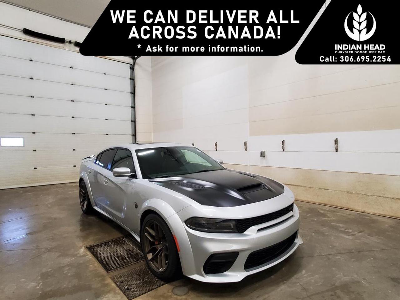 <p>Experience thrilling performance and head-turning style with the 2022 Dodge Charger SRT Hellcat Widebody. Shown in a commanding RWD configuration, this sedan is engineered for exhilarating handling and precise control, making it a perfect match for those who crave power on the road.</p><p>The exterior is a striking presence on any street, complete with bold alloy wheels and the aggressive stance expected from the SRT Hellcat. The sophisticated Black interior offers a haven of luxury and cutting-edge technology. Premium leather seats, a leather-trim steering wheel, and exquisite leather door trim create a refined environment youll love to spend time in.</p><p>Advanced technology takes center stage with smart device integration and an intuitive infotainment system, ensuring you're connected throughout every journey. Safety is never compromised, supported by features such as lane assist, parking sensors, and brake assist, along with a backup camera for added peace of mind.</p><p>This exceptional vehicle is perfect for those who demand high performance, unrivaled luxury, and innovation with every drive. To explore more about the 2022 Dodge Charger SRT Hellcat Widebody, we invite you to contact our dealership today and take a closer look at what makes this car an extraordinary choice.</p>