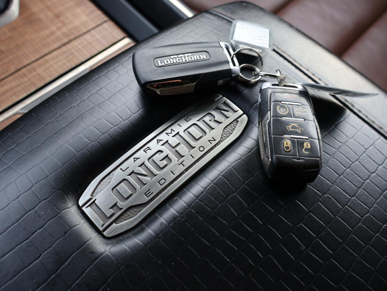 2019 RAM 1500 LARAMIE-LONGHORN 4WD CERTIFIED *ACCIDENT FREE*DODGE MAINTAIN* CAMERA NAV BLUETOOTH LEATHER HEATED SEATS PANO ROOF CRUISE ALLOYS Photo