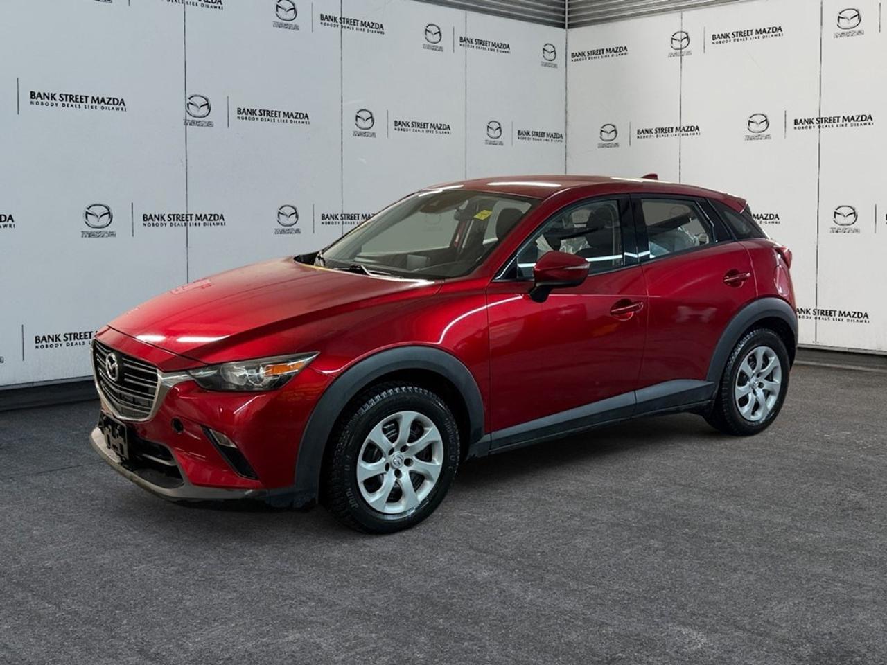 Make your presence known with the mesmerizing 2020 Mazda CX-3 GS in a striking red color. This SUV with front-wheel drive delivers a smooth driving experience and confident handling with its automatic transmission. The elegant exterior is complemented by the refined design of alloy wheels, and the vibrant hue of this model is sure to catch eyes on every corner. Step inside to experience the sophisticated interior, where comfort meets style. With heated seats and a leather steering wheel, the cabin promises warmth and luxury during those cool Canadian days. Designed for the tech-savvy driver, the CX-3 GS is packed with modern features such as smart device integration and a seamless bluetooth connection. Drive with peace of mind using advanced safety options including a backup camera and lane assist to guide and protect. The brake assist system and keyless entry add an extra layer of convenience and safety to your journeys. Perfect for the urban adventurer or young families seeking reliability and style, the 2020 Mazda CX-3 GS caters to those who appreciate a blend of technology and comfort. Contact our dealership today to learn more about this exceptional SUV and why it fits seamlessly into your lifestyle.