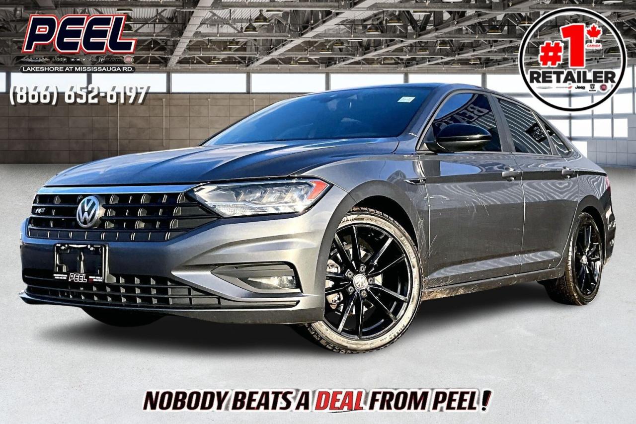 COME SEE WHY NOBODY BEATS A DEAL FROM PEEL! Your Source for ALL make and models used cars and trucks. Canadas #1 Stellantis Retailer for 9 years & counting!!

2019 Volkswagen Jetta Highline R Line FWD | 1.4L TSI Turbocharged Engine | Platinum Grey Metallic | 5-speed Manual Transmission | LOADED | Heated Leather Seats | Power Sunroof | Adaptive Cruise Control 

One Owner Clean Carfax

Enjoy the engaging feel of a premium compact that treats you right inside, with heated leather seats that take the chill off winter mornings, a supportive driving position, and a bright power sunroof that makes the cabin feel open on every commute. Adaptive cruise control adds relaxed highway miles and smart spacing in traffic, so daily driving stays calm and predictable. Finished in Platinum Grey Metallic, the R Line&rsquo;s sport touches sharpen curb appeal, while the lively 1.4L TSI turbo works beautifully with the rare 5 speed manual to give you crisp throttle response, light clutch effort, and excellent fuel economy on city runs and weekend drives. With One Owner Clean Carfax history, this Jetta Highline R Line is a stylish, fun to drive value.
______________________________________________________

Engage & Explore with Peel Chrysler: Whether youre inquiring about our latest offers or seeking guidance, 1-866-652-6197 connects you directly. Dive deeper online or connect with our team to navigate your automotive journey seamlessly.

WE TAKE ALL TRADES & CREDIT. WE SHIP ANYWHERE IN CANADA! OUR TEAM IS READY TO SERVE YOU 7 DAYS!
______________________________________________________
Our advertised prices are for consumers (i.e end users) only. 

*FREE CarFax (click the link above to check it out at no cost to you!)*

*FULLY CERTIFIED! (Have you seen some of these other dealers stating in their advertisements that certification is an additional fee? NOT HERE! Our certification is already included in our low sale prices to save you more!)

______________________________________________________

Peel Chrysler &mdash; A Trusted Destination: Based in Port Credit, Ontario, we proudly serve customers from all corners of Ontario and Canada including Toronto, Oakville, North York, Richmond Hill, Ajax, Hamilton, Niagara Falls, Brampton, Thornhill, Scarborough, Vaughan, London, Windsor, Cambridge, Kitchener, Waterloo, Brantford, Sarnia, Pickering, Huntsville, Milton, Woodbridge, Maple, Aurora, Newmarket, Orangeville, Georgetown, Stouffville, Markham, North Bay, Sudbury, Barrie, Sault Ste. Marie, Parry Sound, Bracebridge, Gravenhurst, Oshawa, Ajax, Kingston, Innisfil and surrounding areas. On our website www.peelchrysler.com, you will find a vast selection of new vehicles including the new and used Ram 1500, 2500 and 3500. Chrysler Grand Caravan, Chrysler Pacifica, Jeep Cherokee, Wrangler and more. All vehicles are priced to sell. We deliver throughout Canada. website or call us 1-866-652-6197. 

Disclaimer Statement: At Peel Chrysler, your satisfaction is our priority. While many pre-owned vehicles originally come with two keys, variations may occur based on trade-ins, and all Peel Chrysler Pre-Owned Vehicles come standard with one key. Any extras provided by the previous owner will be included with your purchase, and additional keys can be bought at the time of sale. Online prices and payments are for finance purchases. Used vehicles that are being financed are subject to a $499 (^$1500 non-prime) financing fee, while cash purchases (certified cheque, bank draft, or wire transfer) on used vehicles have a $2,000 surcharge ( online price + $2,000). Cash purchases of new vehicles only incur applicable taxes and licensing fees, and those priced above $100,000 (including accessories or add-ons) are subject to a federal luxury tax. Optional finance and lease terms are available, and if trading in a vehicle with an outstanding loan balance requiring Peel Chrysler to facilitate the lien payout, a Lien Payout Fee of $349 applies. Prices, rates, and payments are subject to change without notice. While we strive for accuracy, occasional technical or human errors may occur, so we encourage verifying all vehicle details, including features, options, materials, and specifications, with a Peel Chrysler representative by contacting us or visiting our dealership. Experience seamless convenience with our nationwide delivery options. Visit our website or contact us for more details.