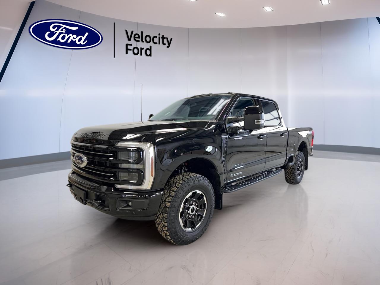 Experience the unmatched capability and refinement of the brand new 2026 Ford Super Duty F-350 SRW Platinum Crew Cab, now available at Velocity Ford in Moose Jaw. Dressed in a bold black exterior with a matching black interior, this four-door powerhouse is engineered for those who demand both luxury and rugged performance. Its 6.7-litre diesel engine, paired with an automatic transmission, ensures robust towing capacity and smooth handling for any challenge.

TRUCK FEATURES
»» Towing capacity of 8,073 kg for heavy loads
»» Four-Wheel Drive (4WD) for enhanced off-road ability
»» Rear tow hook for versatile hauling needs
»» Off-road tires for tough terrain performance

FEATURES OF THE Super Duty F-350 SRW Platinum Crew Cab
»» Power retractable running boards for easy access
»» Ambient lighting package for a premium interior
»» Dual-zone automatic climate control for comfort
»» Memory seats and mirrors for personalized settings

ADVANCED SAFETY FEATURES
»» Blind spot monitor for safer lane changes
»» Lane departure warning for added driver awareness
»» Side impact and head side airbags for protection
»» Child safety locks for peace of mind

PERFORMANCE AND EFFICIENCY
»» 6.7-litre diesel engine for powerful performance
»» Dual shift mode automatic transmission
»» Limited slip differential for improved traction
»» Tire pressure monitoring system for safety

COMFORT AND CONVENIENCE
»» Heated front and rear seats for all-season comfort
»» Power adjustable driver and passenger seats
»» Steering wheel audio controls for easy access
»» Push button start for modern convenience

TECHNOLOGY AND CONNECTIVITY
»» Navigation system (GPS) for confident travel
»» Bluetooth integration for hands-free communication
»» WiFi hotspot for on-the-go connectivity
»» HD radio and satellite radio for entertainment

CARGO SPACE
»» Rear trunk access for easy loading
»» Spacious interior for passengers and gear
»» Retractable mirrors for tight spaces
»» Spare tire included for emergencies

WHAT OTHER OWNERS LIKE
»» Exceptional towing and hauling capability
»» Advanced technology features and connectivity
»» Comfortable, spacious cabin for long drives
»» Reliable safety features for family and work

This 2026 Ford Super Duty F-350 SRW Platinum Crew Cabs VIN is: 1FT8W3BT1TED19652.