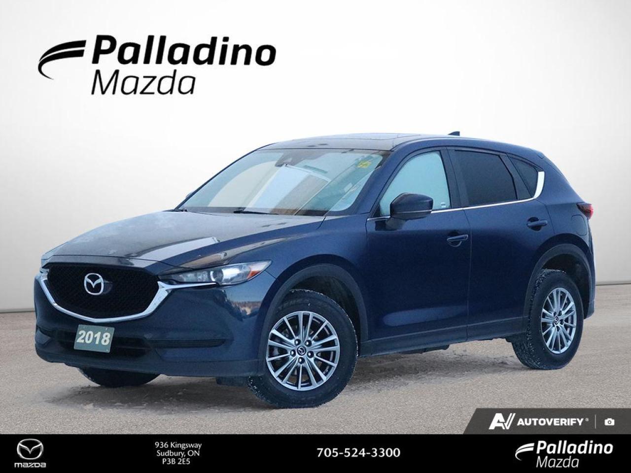 This accident-free 2018 Mazda CX-5 GS, finished in a vibrant blue exterior, is now available at Palladino Mazda in Greater Sudbury. With only 109,125 km on the odometer and a clean CARFAX Canada report, this used SUV offers a reliable and enjoyable driving experience. The 2.5L SKYACTIV-G DOHC 16-Valve 4-Cylinder engine, paired with a 6-speed SKYACTIV-Drive Sport Mode automatic transmission and all-wheel drive, ensures confident performance in all seasons.

FEATURES OF THE CX-5 GS  
»» All-wheel drive for enhanced traction  
»» 6-speed SKYACTIV-Drive Sport Mode transmission  
»» 2.5L SKYACTIV-G DOHC 4-cylinder engine  
»» Blue exterior with modern styling  

ADVANCED SAFETY FEATURES  
»» Comprehensive airbag system for occupant protection  
»» Anti-lock braking system for secure stops  
»» Dynamic stability control for added confidence  
»» Traction control system for improved handling  

PERFORMANCE AND EFFICIENCY  
»» 2.5L engine delivers responsive power  
»» SKYACTIV technology for fuel efficiency  
»» All-wheel drive for all-weather capability  
»» Smooth 6-speed automatic transmission  

COMFORT AND CONVENIENCE  
»» Spacious interior with flexible seating  
»» User-friendly controls for easy access  
»» Ample legroom for driver and passengers  
»» Adjustable steering for personalized comfort  

TECHNOLOGY AND CONNECTIVITY  
»» Intuitive infotainment system  
»» Bluetooth connectivity for hands-free calls  
»» USB input for device charging  
»» Clear, easy-to-read instrument panel  

CARGO SPACE  
»» Generous rear cargo area  
»» Split-folding rear seats for versatility  
»» Low loading height for easy access  
»» Ample storage for everyday needs  

WHAT OTHER OWNERS LIKE  
»» Confident handling in all conditions  
»» Fuel-efficient yet powerful engine  
»» Comfortable and quiet cabin  
»» User-friendly technology features  

This 2018 Mazda CX-5 GSs VIN is: JM3KFBCM2J0405108 .

The advertised price is for financing only and applies exclusively to vehicles eligible for financing. Vehicles sold as-is are not eligible for financing and require full payment at purchase. All cash purchases of finance-eligible vehicles will be subject to an additional $2,501.00. This advertised price also does not include taxes and licensing fees. For as-is vehicles: the motor vehicle sold under this contract is being sold as-is and is not represented as being in road worthy condition, mechanically sound or maintained at any guaranteed level of quality.<p> this used SUV offers a reliable and enjoyable driving experience. The 2.5L SKYACTIV-G DOHC 16-Valve 4-Cylinder engine</p>
<p> ensures confident performance in all seasons.

FEATURES OF THE CX-5 GS  
»» All-wheel drive for enhanced traction  
»» 6-speed SKYACTIV-Drive Sport Mode transmission  
»» 2.5L SKYACTIV-G DOHC 4-cylinder engine  
»» Blue exterior with modern styling  

ADVANCED SAFETY FEATURES  
»» Comprehensive airbag system for occupant protection  
»» Anti-lock braking system for secure stops  
»» Dynamic stability control for added confidence  
»» Traction control system for improved handling  

PERFORMANCE AND EFFICIENCY  
»» 2.5L engine delivers responsive power  
»» SKYACTIV technology for fuel efficiency  
»» All-wheel drive for all-weather capability  
»» Smooth 6-speed automatic transmission  

COMFORT AND CONVENIENCE  
»» Spacious interior with flexible seating  
»» User-friendly controls for easy access  
»» Ample legroom for driver and passengers  
»» Adjustable steering for personalized comfort  

TECHNOLOGY AND CONNECTIVITY  
»» Intuitive infotainment system  
»» Bluetooth connectivity for hands-free calls  
»» USB input for device charging  
»» Clear</p>
<p> easy-to-read instrument panel  

CARGO SPACE  
»» Generous rear cargo area  
»» Split-folding rear seats for versatility  
»» Low loading height for easy access  
»» Ample storage for everyday needs  

WHAT OTHER OWNERS LIKE  
»» Confident handling in all conditions  
»» Fuel-efficient yet powerful engine  
»» Comfortable and quiet cabin  
»» User-friendly technology features  

This 2018 Mazda CX-5 GSs VIN is: JM3KFBCM2J0405108 .

The advertised price is for financing only and applies exclusively to vehicles eligible for financing. Vehicles sold as-is are not eligible for financing and require full payment at purchase. All cash purchases of finance-eligible vehicles will be subject to an additional $2</p>
<p>501.00. This advertised price also does not include taxes and licensing fees. For as-is vehicles: the motor vehicle sold under this contract is being sold as-is and is not represented as being in road worthy condition</p>