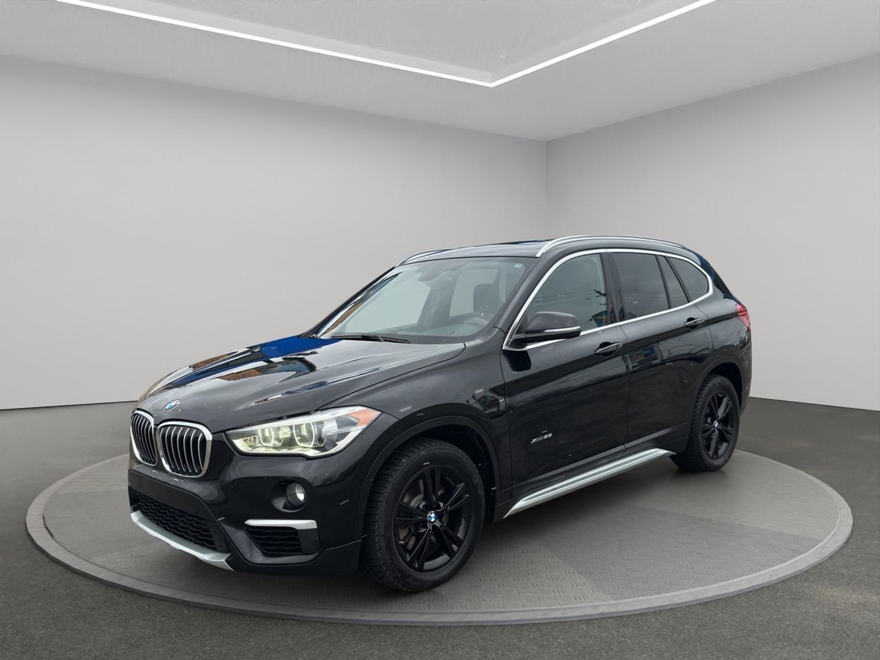 <h2>2017 BMW X1 xDrive28i</h2><p><br></p><p><strong>Now Available at Topnotch Auto Sales Inc</strong></p><p><br></p><p>Discover the perfect blend of performance, luxury, and versatility with the 2017 BMW X1 xDrive28i. Engineered to exemplify BMWs legendary driving experience in a compact and sporty SUV, this X1 is tailor-made for urban commuters and weekend explorers alike. Its athletic stance, robust capability, and refined craftsmanship make it the ideal choice for those seeking style, comfort, and reliability every day. Drive with confidence, whether youre navigating city streets, embarking on road trips, or tackling unpredictable weather conditions.</p><p><br></p><p><br></p><h2>Performance & Capability</h2><p><br></p><p>Under the hood, the 2017 BMW X1 xDrive28i is powered by a dynamic turbocharged engine paired seamlessly with an advanced automatic transmission, delivering exhilarating acceleration and smooth, responsive handling. Equipped with BMWs renowned xDrive all-wheel drive system, this SUV ensures superb traction, stability, and control no matter the road or weather conditions. Experience a perfect harmony of sporty performance and impressive fuel efficiency, making the X1 an excellent companion for both short commutes and extended journeys.</p><p><br></p><p><br></p><h2>Interior Comfort & Features</h2><p><br></p><p>Step inside to a thoughtfully designed cabin, reflecting BMWs dedication to quality and driver-centric ergonomics. Notable interior highlights include:</p><p><br></p><ul><li><br></li><li>Seating for up to five, with high-quality upholstery and premium materials throughout</li><li><br></li><li>Power-adjustable front seats to achieve your ideal driving position</li><li><br></li><li>Dual-zone automatic climate control for personalized comfort in all seasons</li><li><br></li><li>Power windows, door locks, and side mirrors for everyday convenience</li><li><br></li><li>Generous cargo space with easily folding rear seats for enhanced flexibility</li><li><br></li><li>A sleek, modern layout with driver-focused controls and refined trim</li><li><br></li></ul><p><br></p><p>The X1s interior combines everyday practicality with the luxury touches BMW is known for, creating a welcoming ambience for every journey.</p><p><br></p><p><br></p><h2>Technology & Connectivity</h2><p><br></p><p>Stay connected and entertained with an array of advanced technology features, including:</p><p><br></p><ul><li><br></li><li>BMWs intuitive iDrive infotainment system with a high-resolution display screen</li><li><br></li><li>Bluetooth hands-free calling and audio streaming for safe, effortless connectivity</li><li><br></li><li>USB ports for charging devices and media integration</li><li><br></li><li>Steering-wheel-mounted controls for easy and safe access to key functions</li><li><br></li><li>Premium sound system to deliver an immersive audio experience</li><li><br></li></ul><p><br></p><p>No matter where the road takes you, enjoy seamless access to your favorite content and communication tools, all within reach.</p><p><br></p><p><br></p><h2>Safety & Peace of Mind</h2><p><br></p><p>The BMW X1 xDrive28i is engineered with your safety as a top priority, featuring a suite of advanced systems such as:</p><p><br></p><ul><li><br></li><li>Rearview camera to assist with parking and reversing</li><li><br></li><li>BMW xDrive all-wheel drive for unmatched road-holding ability</li><li><br></li><li>Dynamic Stability Control and Traction Control for enhanced safety</li><li><br></li><li>Anti-lock Braking System (ABS) for reliable stopping power</li><li><br></li><li>Comprehensive airbag coverage for all occupants</li><li><br></li><li>Tire Pressure Monitoring System for added safety assurance</li><li><br></li></ul><p><br></p><p>Count on BMWs commitment to passenger protection and peace of mind every time you get behind the wheel.</p><p><br></p><p><br></p><h2>Vehicle Condition</h2><p><br></p><p>This 2017 BMW X1 xDrive28i is presented in pristine, non-smoking condition both inside and out. Meticulously detailed and thoroughly inspected, it demonstrates clear pride of ownership and is prepared for its next chapter with you.</p><p><br></p><p><br></p><h2>Why Choose Topnotch Auto Sales?</h2><p><br></p><p>At Topnotch Auto Sales Inc, we are dedicated to providing only premium pre-owned vehicles and top-tier customer care. Our knowledgeable staff are committed to making your purchasing experience smooth, open, and stress-freefrom the first inquiry to final delivery.</p><p><br></p><p><br></p><h2>Flexible Financing Solutions</h2><p><br></p><p>Enjoy fast, straightforward financing approvals for <strong>all credit situations</strong>, including bad credit, no credit, new credit, or previous repossessions. Benefit from same-day approvals and flexible, low down payment options designed to fit your needs.</p><p><br></p><p><br></p><h2>Certification Option</h2><p><br></p><p>Have your 2017 BMW X1 xDrive28i certified for <strong>only $799</strong>, ensuring it complies with all Ontario safety standards for added safety and confidence on the road.</p><p><br></p><p><br></p><h2>OMVIC Compliance</h2><p><br></p><p><strong>Note:</strong> Uncertified vehicles are sold asis and require certification to be road-ready in accordance with OMVIC regulations. Our team is available to assist you with the certification process for a hassle-free experience.</p><p><br></p><p><br></p><p>With over <strong>14 years of industry expertise</strong>, Topnotch Auto Sales Inc has earned a reputation for integrity, quality inventory, and exceptional customer service. We are proud to be your trusted automotive partner in <strong>{location}</strong>, and look forward to helping you find your next vehicle.</p><p><br></p><p><br></p><p> <strong>Visit Us At:</strong></p><p><br></p><p>5455 Steeles Ave W, North York, ON M9L 1S7</p><p><br></p><p> <strong>Call or Text:</strong></p><p><br></p><p>416-879-7113</p>