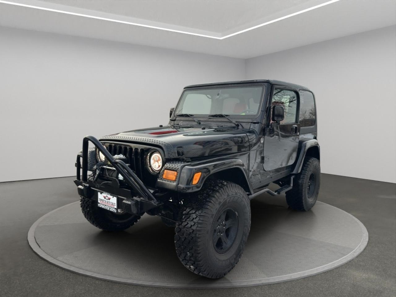 <h2>2005 Jeep Wrangler Unlimited Rubicon</h2><p><br></p><p><strong>Now Available at Topnotch Auto Sales Inc</strong></p><p><br></p><p>Discover the true spirit of adventure with the 2005 Jeep Wrangler Unlimited Rubicona vehicle designed and engineered for those who crave exceptional off-road prowess<span id=jodit-selection_marker_1785168243371_1233013639854863 data-jodit-selection_marker=start style=line-height: 0; display: none;></span> without compromising daily drive comfort. Recognized worldwide for its legendary 4x4 capability, unmistakable rugged style, and dependable performance, this Wrangler Rubicon trim is the perfect companion for off-road enthusiasts and everyday drivers alike. Whether youre seeking to master challenging trails or enjoy the freedom of open-road cruising, the Wrangler Unlimited Rubicon stands ready to deliver an authentic Jeep experience wherever your journey takes you.</p><p><br></p><p><br></p><p><br></p><h2>Performance & Capability</h2><p><br></p><p>Powered by Jeeps time-tested engine and robust transmission, the 2005 Wrangler Unlimited Rubicon offers remarkable strength and reliability. Outfitted with the best-in-class Rubicon package, it features heavy-duty front and rear locking differentials, ultra-durable axles, and a specialized low-range transfer caseall engineered to optimize traction, handling, and stability on the toughest terrain. From rocky trails and snowy roads to urban commutes, this Rubicon ensures exceptional confidence and control in any driving environment. No challenge is too demanding for this purpose-built icon.</p><p><br></p><p><br></p><p><br></p><h2>Interior Comfort & Features</h2><p><br></p><p>True to its adventurous legacy, the Wrangler Unlimited Rubicon boasts a cabin built for both functionality and comfort. Inside, youll find:</p><p><br></p><ul><li><br></li><li>Seating for up to four occupants, offering a comfortable ride for every passenger</li><li><br></li><li>Resilient, adventure-ready interior materials ideal for active lifestyles</li><li><br></li><li>Easy-to-clean cabin finishes that stand up to mud, water, or dust</li><li><br></li><li>Fold-down rear seats for expanded cargo versatility</li><li><br></li><li>Removable doors and roof panels to transform your drive into an open-air experience</li><li><br></li><li>Ergonomically designed, driver-focused controls and layout</li><li><br></li></ul><p><br></p><p>This Jeep seamlessly blends durability with signature style, ensuring every adventure is as enjoyable as the destination.</p><p><br></p><p><br></p><p><br></p><h2>Technology & Convenience</h2><p><br></p><p>Simplicity meets reliability in the Wrangler Unlimited Rubicons thoughtfully designed cabin. Enjoy:</p><p><br></p><ul><li><br></li><li>User-friendly audio system for entertainment on the go</li><li><br></li><li>Intuitive dashboard layout for effortless access to controls</li><li><br></li><li>Power accessories (where equipped) for added convenience</li><li><br></li><li>Climate control to keep you comfortable in any season</li><li><br></li></ul><p><br></p><p>Everything is purpose-built to enhance your experienceso you can focus on the journey ahead.</p><p><br></p><p><br></p><p><br></p><h2>Safety & Peace of Mind</h2><p><br></p><p>Drive with confidence knowing the 2005 Wrangler Unlimited Rubicon includes essential safety features such as:</p><p><br></p><ul><li><br></li><li>Anti-lock braking system (ABS) for controlled stopping power</li><li><br></li><li>Advanced 4x4 traction for superior grip on challenging surfaces</li><li><br></li><li>Driver and front-passenger airbags</li><li><br></li><li>Sturdy body-on-frame construction that delivers outstanding durability</li><li><br></li></ul><p><br></p><p>Engineered for protection on every drivewherever your next adventure leads.</p><p><br></p><p><br></p><p><br></p><h2>Vehicle Condition</h2><p><br></p><p>This 2005 Jeep Wrangler Unlimited Rubicon is presented in excellent, non-smoking condition inside and out. Thoroughly inspected and professionally detailed, it showcases careful ownership and is ready to embark on its next journey with you.</p><p><br></p><p><br></p><p><br></p><h2>Why Choose Topnotch Auto Sales?</h2><p><br></p><p>At Topnotch Auto Sales Inc, we are committed to offering high-quality pre-owned vehicles backed by outstanding customer care. Our knowledgeable team provides a seamless, transparent, and stress-free shopping experience for every client.</p><p><br></p><p><br></p><p><br></p><h2>Flexible Financing Solutions</h2><p><br></p><p>We offer a full range of financing options tailored for <strong>all credit types</strong>, including those with bad credit, no credit, or recent repossessions. Benefit from same-day approvals and competitive down payment arrangements designed to fit your needs.</p><p><br></p><p><br></p><p><br></p><h2>Certification Option</h2><p><br></p><p>Certify your 2005 Jeep Wrangler Unlimited Rubicon for only <strong>$799</strong>, ensuring full compliance with Ontario safety standards and added peace of mind with your purchase.</p><p><br></p><p><br></p><p><br></p><h2>OMVIC Compliance</h2><p><br></p><p><strong>Note:</strong> Vehicles sold uncertified are offered asis and require certification before road use in accordance with OMVIC regulations. Our team is here to assist and guide you through the certification process.</p><p><br></p><p><br></p><p><br></p><p>With over <strong>14 years of trusted industry experience</strong>, Topnotch Auto Sales Inc is renowned for integrity, top-quality vehicles, and a customer-first approach. We proudly serve drivers throughout Ontario&nbsp;and beyond as your trusted automotive dealership.</p><p><br></p><p><br></p><p><br></p><p> <strong>Visit Us At:</strong></p><p><br></p><p>5455 Steeles Ave W, North York, ON M9L 1S7</p><p><br></p><p> <strong>Call or Text:</strong></p><p><br></p><p>416-879-7113</p>