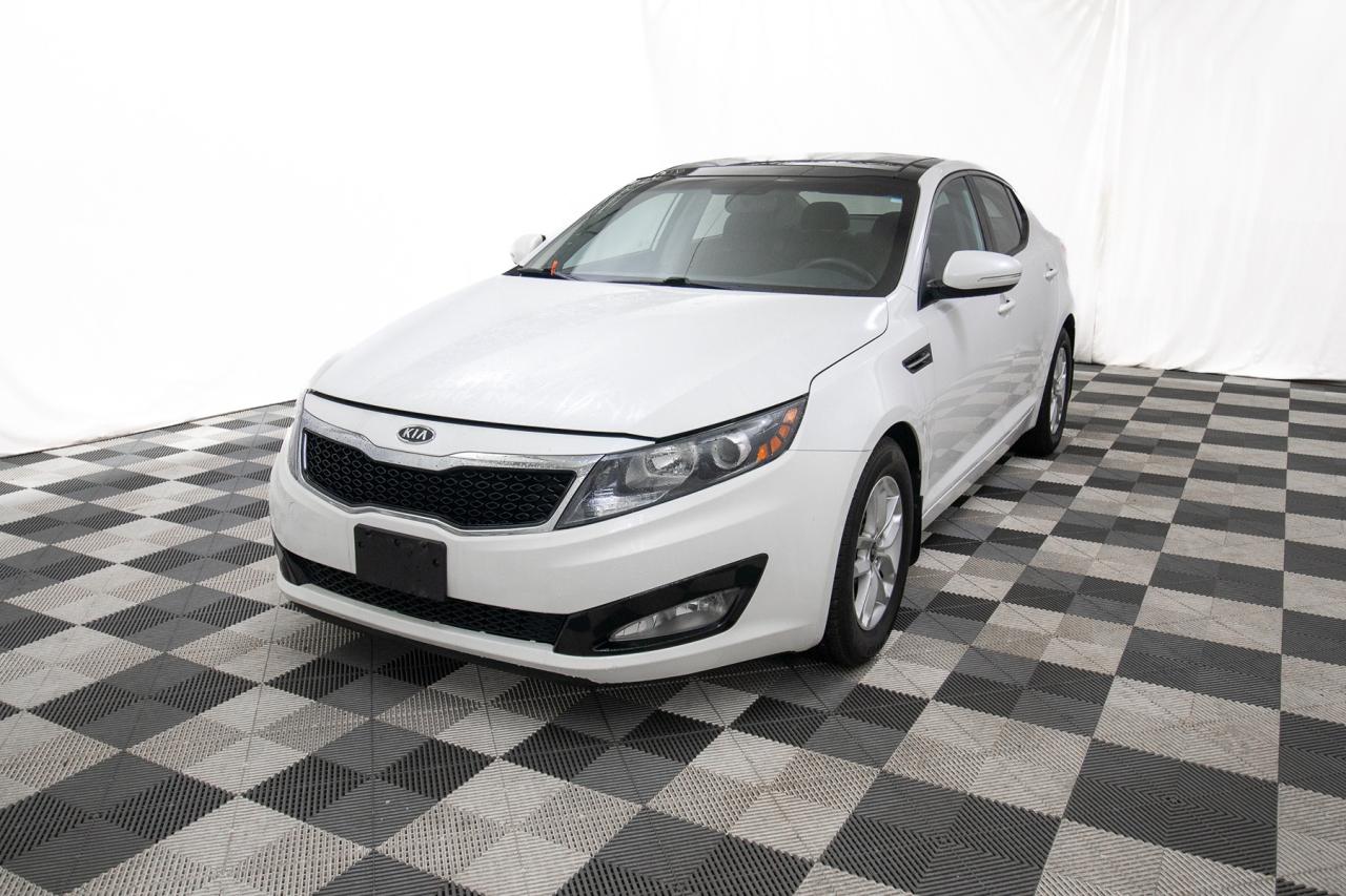 <p>Looking for a reliable and stylish sedan? Look no further than this pristine 2012 Kia Optima LX, available now at Key West Ford! This sleek white sedan offers a comfortable and efficient driving experience, perfect for navigating city streets or embarking on weekend getaways. With its automatic transmission and front-wheel drive, the Optima LX provides a smooth and easy ride. This Optima has been well-maintained and comes with a low odometer reading of only 103,467km.</p><p>This Kia Optima LX boasts a range of features designed to enhance your driving pleasure. Enjoy a modern and comfortable interior, coupled with a fuel-efficient gasoline engine that helps you save at the pump. The four-door design offers easy access for passengers, making it a practical choice for families or individuals seeking a versatile vehicle.</p><p>Here are five features that make this 2012 Kia Optima LX truly stand out:</p><ul><li><strong>Sleek and Modern Design:</strong> Turn heads with its stylish and aerodynamic exterior.</li><li><strong>Automatic Transmission:</strong> Experience effortless shifting and a smooth ride.</li><li><strong>Fuel-Efficient Engine:</strong> Save money on gas and enjoy longer drives.</li><li><strong>Comfortable Interior:</strong> Relax and enjoy the ride with a well-appointed cabin.</li><li><strong>Reliable Performance:</strong> Drive with confidence knowing this Optima LX has been well maintained.</li></ul><p>Visit Key West Ford today to see this exceptional Kia Optima LX for yourself!</p><p><strong><em>Powered by AutoIntelligence&trade;</em></strong> Vehicle information has been generated using artificial intelligence and is provided for informational purposes only. While efforts are made to ensure accuracy, please confirm all details directly with the dealer.</p><p>Experience peace of mind with our Buy With Confidence program! This vehicle comes with a comprehensive mechanical and safety inspection, Carfax report, and full disclosure. We are committed to transparent pricing. The advertised price excludes fees: $699 Documentation, $349 Registration/Insurance Transfer, $695 Finance Administration Fee (if applicable), and taxes. As BCs #1 Volume Dealer and #1 for Customer Experience on DealerRater, we prioritize your satisfaction. See Key West Ford for complete details. Book your test drive today!&nbsp; Dealer #7485</p>