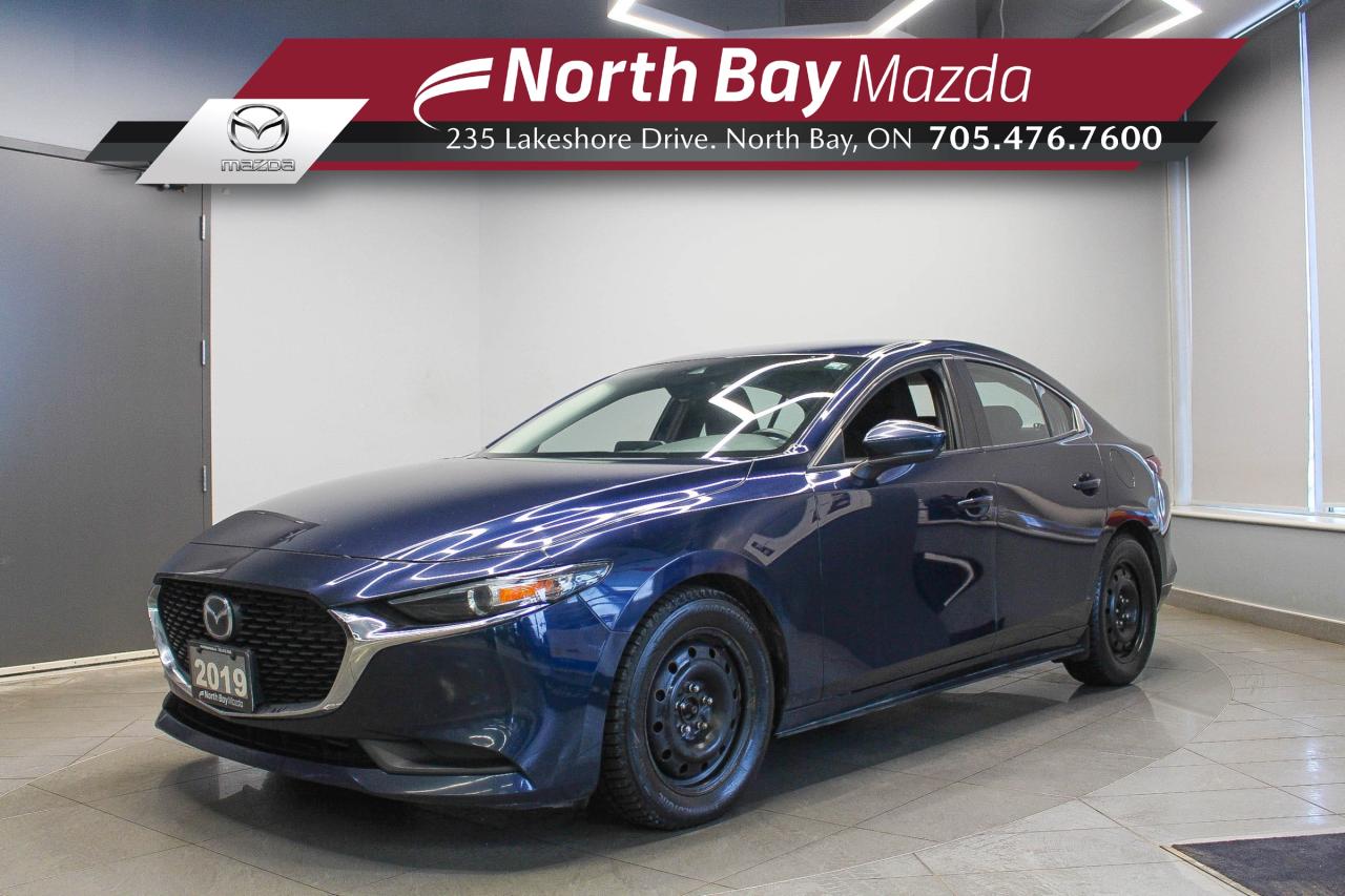This 2019 Mazda 3 is a great choice if you want a compact car that feels sharp, premium, and enjoyable behind the wheel. Whether youre commuting, running errands, or heading out on a road trip, the 2019 Mazda 3 offers a comfortable ride with modern features youll use. FEATURES: FWD, Cloth upholstery, Heated  front seats, Heated steering wheel, Mazda Connect infotainment system, Apple CarPlay & Android Auto, Bluetooth connectivity, Backup camera, Cruise control, Keyless entry & push-button start. 

Why Youll Want to Buy from North Bay Mazda? *The Clubhouse Commitment Pre-Owned Vehicle Program provides you with additional coverage for things such as the 3-year Tire and Rim Coverage, The Clubhouse Powertrain Warranty, coverage for The Little Things like battery, wiper, and bulb replacement, 3- year anti-theft protection to give you the ultimate peace of mind when purchasing a pre-owned vehicle. Clubhouse Commitment is an optional coverage which 
can be purchased at time of sale for a $699 value. Pre-Owned Vehicle purchases are subject to an adjusted price when purchasing with cash. You are eligible for Finance Pricing with a maximum down payment of 15% of listed finance price. Contact us for more details. * Our certified vehicles go through a 120-point Clubhouse Certified Used Vehicle Inspection, and we will provide the CarFax vehicle history documents as well as any available service history. * We competitively price our vehicles below the market average which means that we have already done all the market research for you. Rest assured that you are getting the best deal possible. * We have automotive financial experts who are experienced in dealing with all levels of credit challenges. We also work with all major banks and third-party lenders daily so we are confident that we can get you the best rate available. * As a premier New and Pre-Owned vehicle 
dealership, we pride ourselves on a superior customer experience and a lifetime of customer care. We are conveniently located at 235 Lakeshore Drive, in North Bay, Ontario. If you cant make it to us, we can accommodate you! Call us today at 705-476-7600 to come in and see this vehicle!