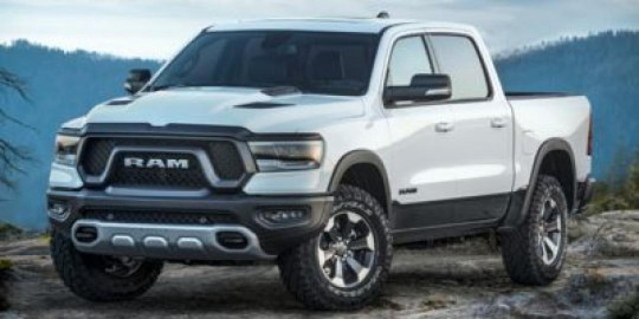 This 2023 Ram 1500 Rebel blends rugged capability with modern style and everyday comfort, making it the perfect choice for adventure seekers and truck enthusiasts alike. Powered by a robust engine and equipped with off-road-ready features like all-terrain tires, lifted suspension, and Rebel-specific styling, this truck is built to tackle trails and highways with confidence. Inside, youll find a spacious, well-appointed cabin with the latest tech, premium materials, and thoughtful conveniences that make every drive enjoyable. With Rams commitment to performance, comfort, and dependability, this 1500 Rebel stands out as a versatile and exciting truck ready for work, play, and everything in between.