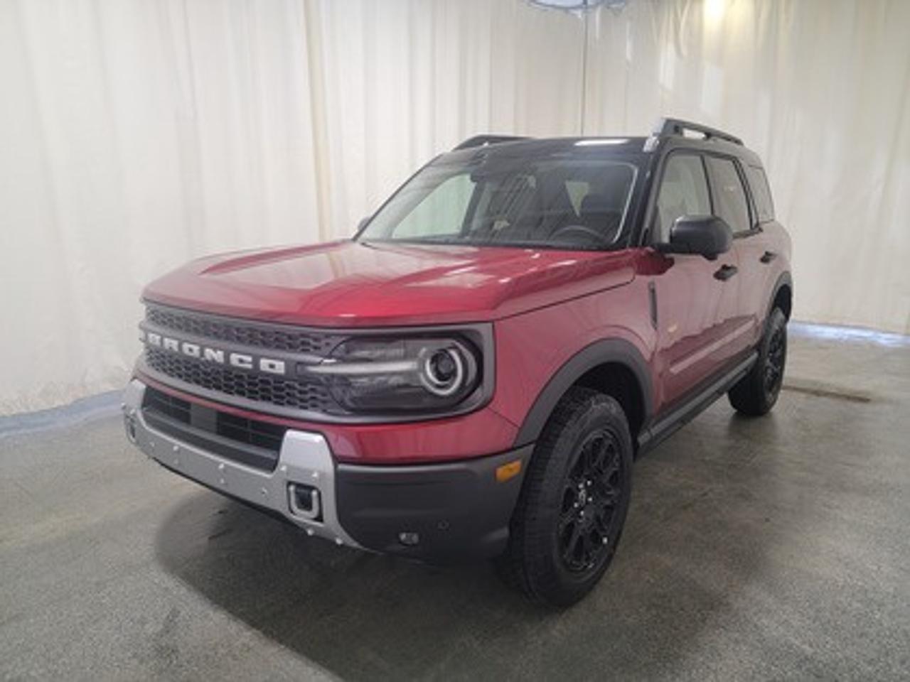 This all-new 2026 Ford Bronco Sport Badlands 400A stands out in Ruby Red Metallic Tinted Clearcoat, showcasing a rugged yet refined look. This 5-passenger SUV is equipped with the 2.0L EcoBoost® engine, producing 250 horsepower and 277 lb-ft of torque. Paired with an 8-speed automatic transmission, this vehicle ensures seamless power delivery both on and off the road, it is engineered to conquer tough terrains with ease.

This vehicle comes with the All-Weather Packageready to take on any season!
Snow, rain, mud, or sunshinethis vehicle is built for it all! The All-Weather Package adds extra protection where it matters most, with premium mud flaps to shield your paint from road debris, all-weather floor mats to protect your interior from lifes messes, and Xpel paint protection to help guard against those infuriating rock chips. Drive with confidence, knowing your investment is protected from Regina's elements.

Key Features:
Advanced 4x4 with Terrain Management System and 7 G.O.A.T. Modes
Leather-Trimmed Sport Heated Front Seats
Heated Premium-Wrapped Steering Wheel
Rubberized Floor and Cargo Area for Easy Cleaning
HOSS 2.0 Off-Road Suspension
17 Matte Black-Painted Aluminum Wheels with All-Terrain Tires
Class II Trailer Tow Package with Trailer Sway Control
Ford Co-Pilot360 Assist 2.0, including:
360-Degree Camera with Trail View
Reverse Brake Assist
Front Parking Sensors
12.3 Digital Instrument Panel Cluster
SYNC® 4 with a 13.2 Center Display, featuring Wireless Apple CarPlay® and Android Auto
Trail Control with One-Pedal Driving
Power Moonroof
Badlands Tech Package 
 -HD Radio

Designed for adventure, the Badlands 400A delivers confidence in harsh weather and challenging landscapes. Features like D-ring recovery hooks, and a 110V/400W AC power outlet ensure you're equipped for any situation. Its tech-forward interior includes dual-zone automatic climate control and universal garage door opener, under seat storage compartment and even a bottle opener for ultimate convenience.

Bennett Dunlop Ford, proudly serving Regina for over 40 years, is conveniently located at 770 Broad Street. With over 3,500 Google reviews, our reputation reflects our commitment to providing a fast, easy, and enjoyable vehicle-buying experience. We eliminate the hassle with no admin or documentation fees, transparent upfront pricing that lets you shop with total confidence. But were more than just a dealershipwere driven to make a difference by supporting local community initiatives and events that matter to you. Visit Bennett Dunlop Ford today and experience why were Reginas trusted choice for quality vehicles, exceptional service, and a genuine commitment to driving change in our community!