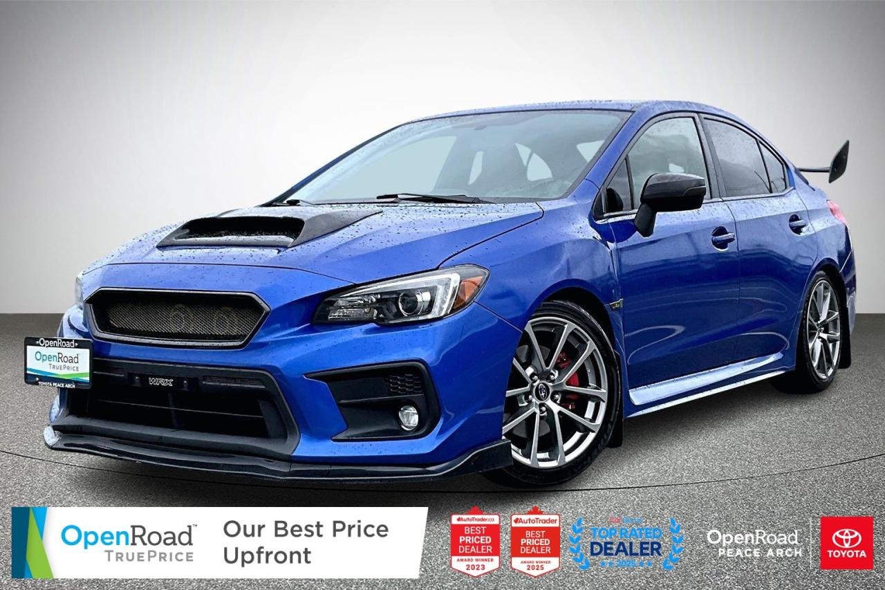 The 2019 Subaru WRX 4-Door Sport-Tech Package with a 6-speed manual delivers a balanced mix of performance and refinement. It features a turbocharged 2.0-litre Boxer engine producing 268 horsepower, paired with Subaru&rsquo;s Symmetrical All-Wheel Drive for confident handling. The Sport-Tech package adds 18-inch alloy wheels, a sport-tuned suspension, leather-trimmed seating, a power sunroof, and a rear spoiler. Inside, it offers a touchscreen infotainment system with navigation, smartphone integration, and a premium Harman Kardon sound system. Comfort and convenience are enhanced by heated front seats, push-button start, automatic climate control, and advanced stability and braking systems.  As a proud member of the OpenRoad Auto Group, a trusted name since 2000 serving the Lower mainland (including White Rock, Surrey, Langley, Maple Ridge, Delta, Richmond, Mission and beyond) with outstanding Toyota vehicles, Toyota parts, and Toyota service since 1966! OpenRoad Toyota Peace Arch is a &ldquo;True Price&rdquo; dealer, meaning no inflated prices, and no need for back and forth haggling! We use up to the minute technology offering LIVE MARKET VALUE PRICING to ensure you are receiving the most competitive price possible on all of our Pre-Owned vehicles!  All advertised vehicle prices do not include our $599 documentation fee.