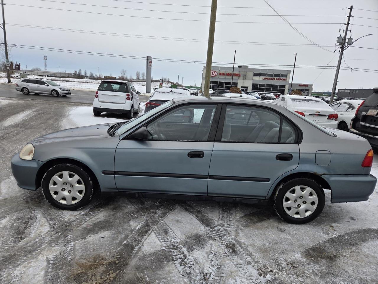 1999 Honda Civic LX, SEDAN, AUTO, ONLY 184KMS, RUNS WELL, AS IS Photo