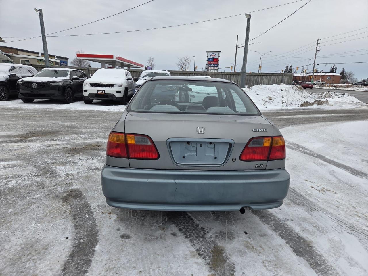 1999 Honda Civic LX, SEDAN, AUTO, ONLY 184KMS, RUNS WELL, AS IS Photo