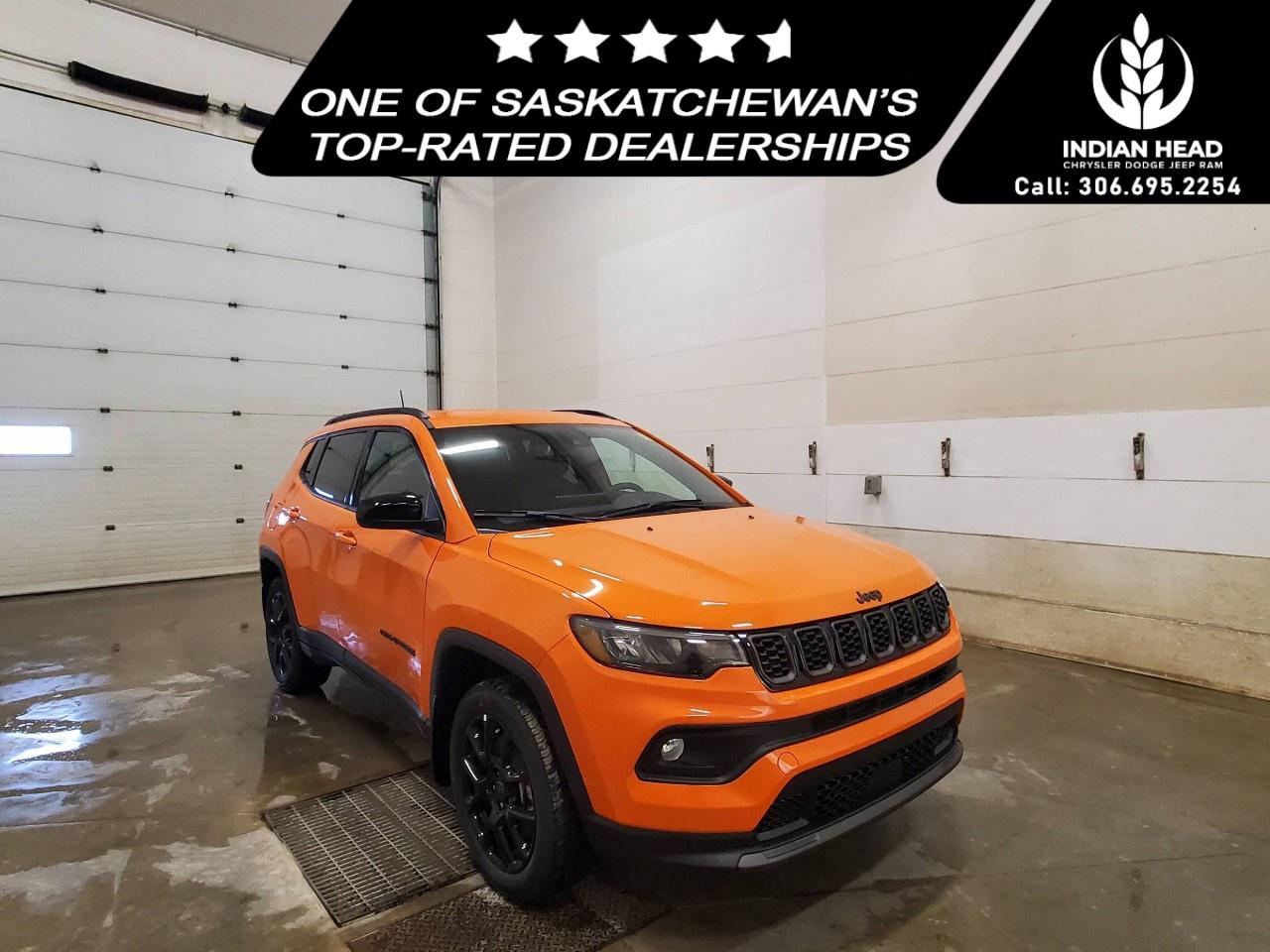 <p>Experience adventure like never before with the <strong>2026 Orange Jeep Compass North 4x4</strong>. Designed for the bold, this SUV combines a striking orange exterior with confident 4x4 drivetrain capabilities, ensuring superior handling on and off the road.</p> <p>Its vibrant orange exterior is paired with a stylish interior that echoes the same dynamic hue, featuring refined comforts such as leather steering wheel and heated mirrors. The Compass Norths body is as expressive as it is functional, complemented by alloy wheels and smart device integration to keep you connected.</p> <p>Equipped with state-of-the-art technology, this Compass includes an automatic transmission that effortlessly combines with modern features like a wi-fi hotspot, satellite radio, and a backup camera. Navigate your travels with peace of mind thanks to safety enhancements like lane assist and brake assist. Revel in comfort with heated seats, a heated steering wheel, and advanced climate control.</p> <p>Perfect for adventurous families or the solo adventurer, this Jeep Compass is ready to meet your every need. Take control of your journey and feel the excitement. Contact our dealership today to learn more about your future vehicle.</p>