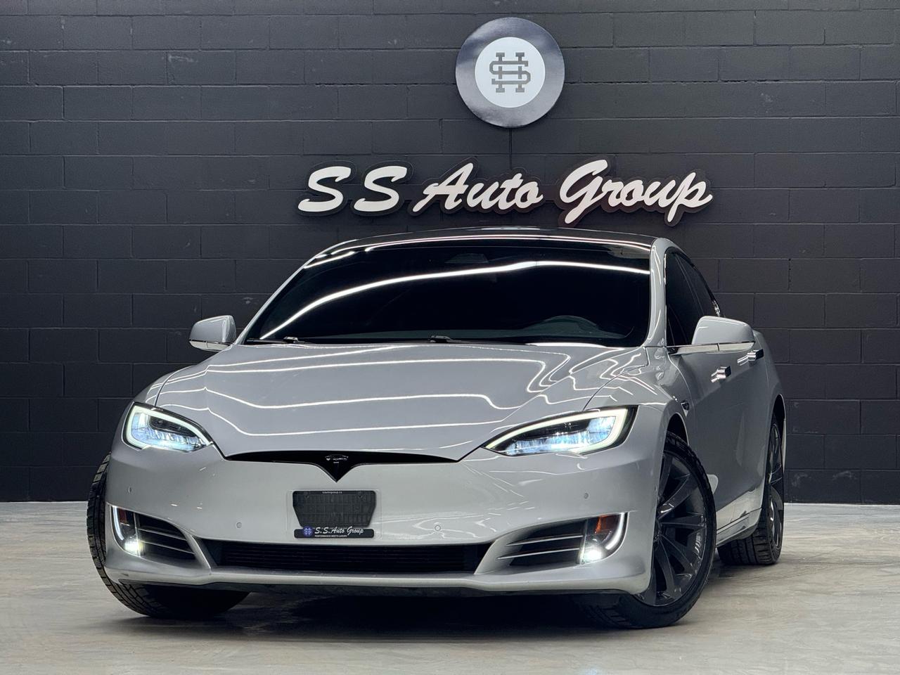 <p class=MsoNormal><span style=font-size: 9.0pt; line-height: 107%; mso-bidi-font-family: Calibri; mso-bidi-theme-font: minor-latin;>EXTENDED WARRANTY PACKAGES AVAILABLE UPTO 4 YEARS UNLIMITED KMS. &nbsp;CARFAX REPORT IS VERIFIED AND AVAILABLE UPON REQUEST.</span></p><p class=MsoNormal><span style=font-size: 9.0pt; line-height: 107%; mso-bidi-font-family: Calibri; mso-bidi-theme-font: minor-latin;>&nbsp;</span></p><p class=MsoNormal style=mso-margin-top-alt: auto; mso-margin-bottom-alt: auto; line-height: normal;><span style=font-size: 9.0pt; mso-fareast-font-family: Times New Roman; mso-bidi-font-family: Calibri; mso-bidi-theme-font: minor-latin; color: black; background: #FBFBFB; mso-fareast-language: EN-CA;>2017 TESLA MODEL S 75D HAS LANDED. &nbsp;SILVER EXTERIOR ON BLACK INTERIOR. &nbsp;FULLY LOADED WITH FULL SELF DRIVING AUTOPILOT, HEATED SEATS FRONT AND REAR, NAVIGATION SYSTEM, PANORAMIC GLASS ROOF, BACKUP CAMERA, 19 INCH WHEELS, HEATED STEERING, KEYLESS ACCESS AND MUCH MORE. <span style=mso-spacerun: yes;>&nbsp;</span></span></p><p class=MsoNormal>&nbsp;</p><p class=MsoNormal><span style=color: rgb(0, 0, 0);><strong><span style=font-size: 9.0pt; line-height: 107%; mso-bidi-font-family: Calibri; mso-bidi-theme-font: minor-latin;>CERTIFICATION AVAILABLE FOR AN ADDITIONAL $999 &ndash;&nbsp;</span></strong><span style=font-size: 9.0pt; line-height: 107%; mso-bidi-font-family: Calibri; mso-bidi-theme-font: minor-latin;>IF NOT CERTIFIED AS PER OMVIC REGULATIONS THE VEHICLE IS DEEMED NOT DRIVABLE AND UNCERTIFIED.&nbsp;&nbsp;THIS FEE WILL ENSURE VEHICLE IS CERTIFIED AND ROAD WORTHY CONDITION. ADVERTISED PRICE EXCLUDES APPLICABLE TAXES, LICENSING, ADMINISTRATIVE, AND FINANCE FEES.</span></span></p><p class=MsoNormal><span style=font-size: 9pt; line-height: 107%; color: rgb(0, 0, 0);>&nbsp;</span></p><p class=MsoNormal><span style=font-size: 9pt; line-height: 107%; color: rgb(0, 0, 0);>OUR VEHICLES ARE PRICED TO SELL.&nbsp; DRIVE THIS HOME TODAY!&nbsp;&nbsp;CONTACT US FOR MORE DETAILS.</span></p><p class=MsoNormal><span style=font-size: 9pt; line-height: 107%; color: rgb(0, 0, 0);>&nbsp;</span></p><p class=MsoNormal><span style=font-size: 9pt; line-height: 107%; color: rgb(0, 0, 0);>S S AUTO GROUP INC.</span></p><p class=MsoNormal><span style=font-size: 9pt; line-height: 107%; color: rgb(0, 0, 0);>460 WOODY ROAD</span></p><p class=MsoNormal><span style=font-size: 9pt; line-height: 107%; color: rgb(0, 0, 0);>OAKVILLE, ONTARIO L6K 3T6</span></p><p class=MsoNormal><span style=font-size: 9pt; line-height: 107%; color: rgb(0, 0, 0);>&nbsp;</span></p><p class=MsoNormal><span style=font-size: 9pt; line-height: 107%; color: rgb(0, 0, 0);>CALL: (9 0 5) - 3 3 8 - 7 7 0 7</span></p><p class=MsoNormal><span style=font-size: 9pt; line-height: 107%; color: rgb(0, 0, 0);>TEXT: (6 4 7) - 8 8 6 - 8 1 8 2&nbsp; OR&nbsp; (6 4 7) - 5 2 3 - 0 0 6 9</span></p><p class=MsoNormal><span style=font-size: 9pt; line-height: 107%; color: rgb(0, 0, 0);>INSTAGRAM: @SSAUTOGROUP_</span></p>